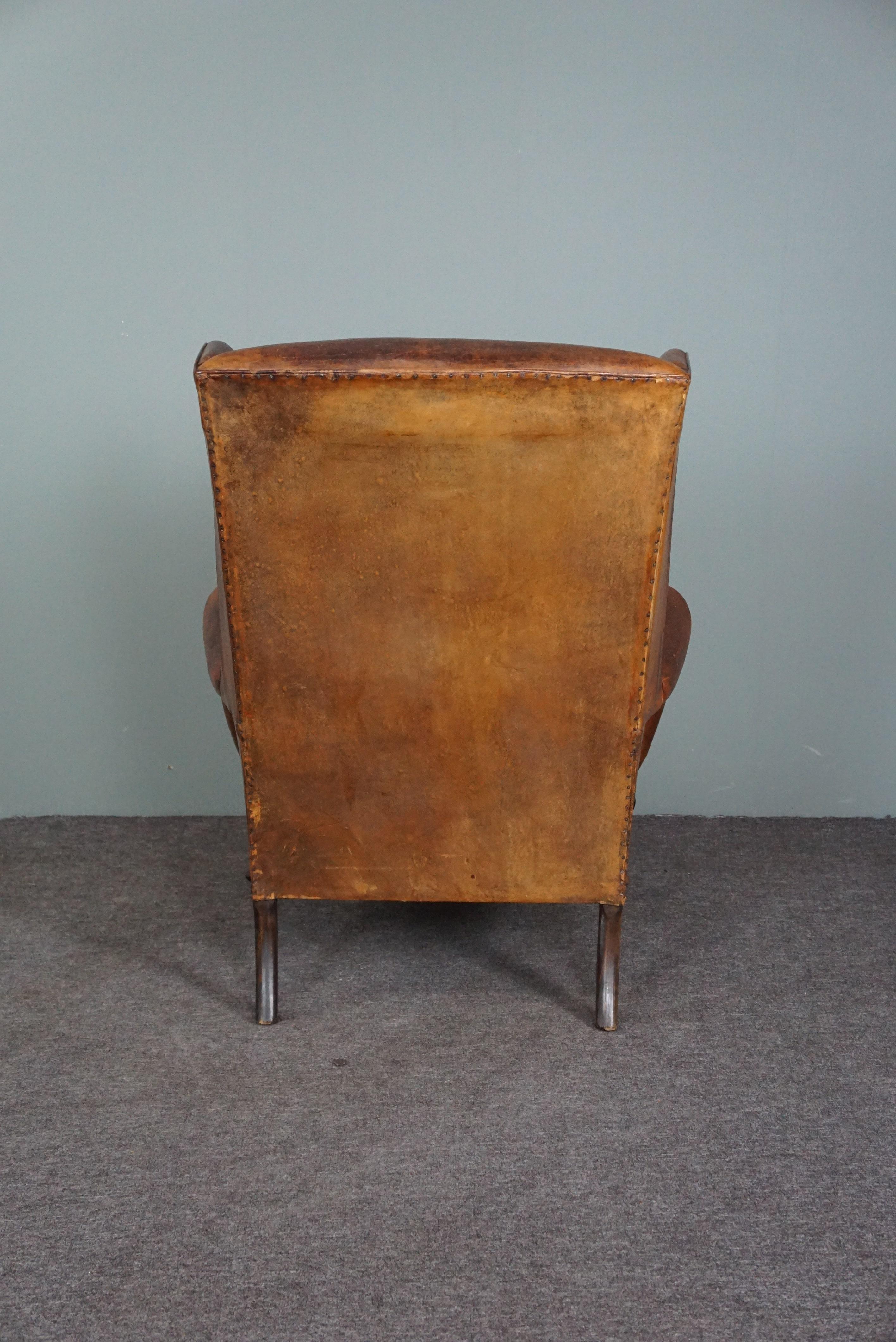 Dutch Patinated sheepskin antique Wingback wingback armchair For Sale