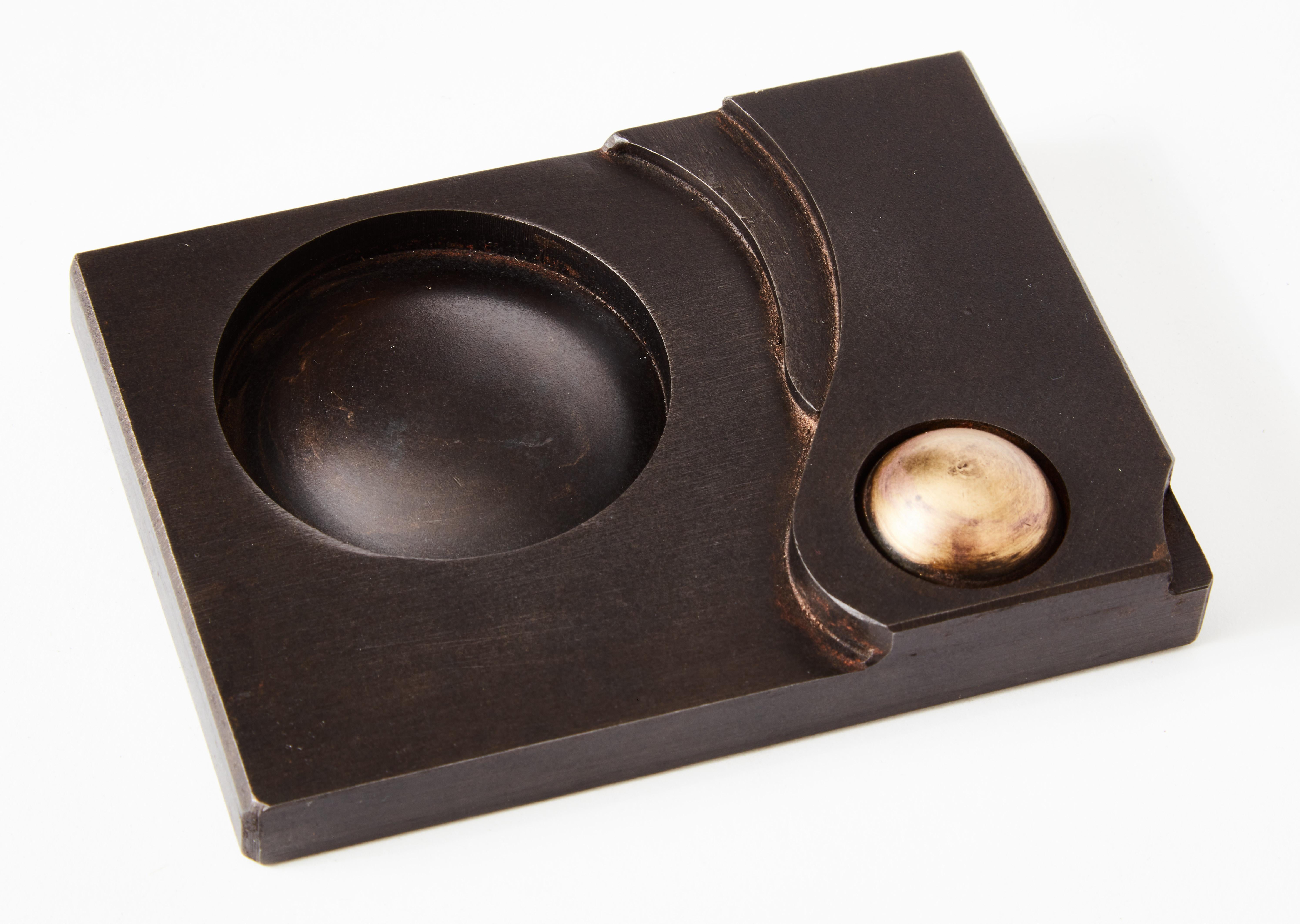 Art Deco Felt Lined Steel and Brass 'Waveform' Paperweight For Sale