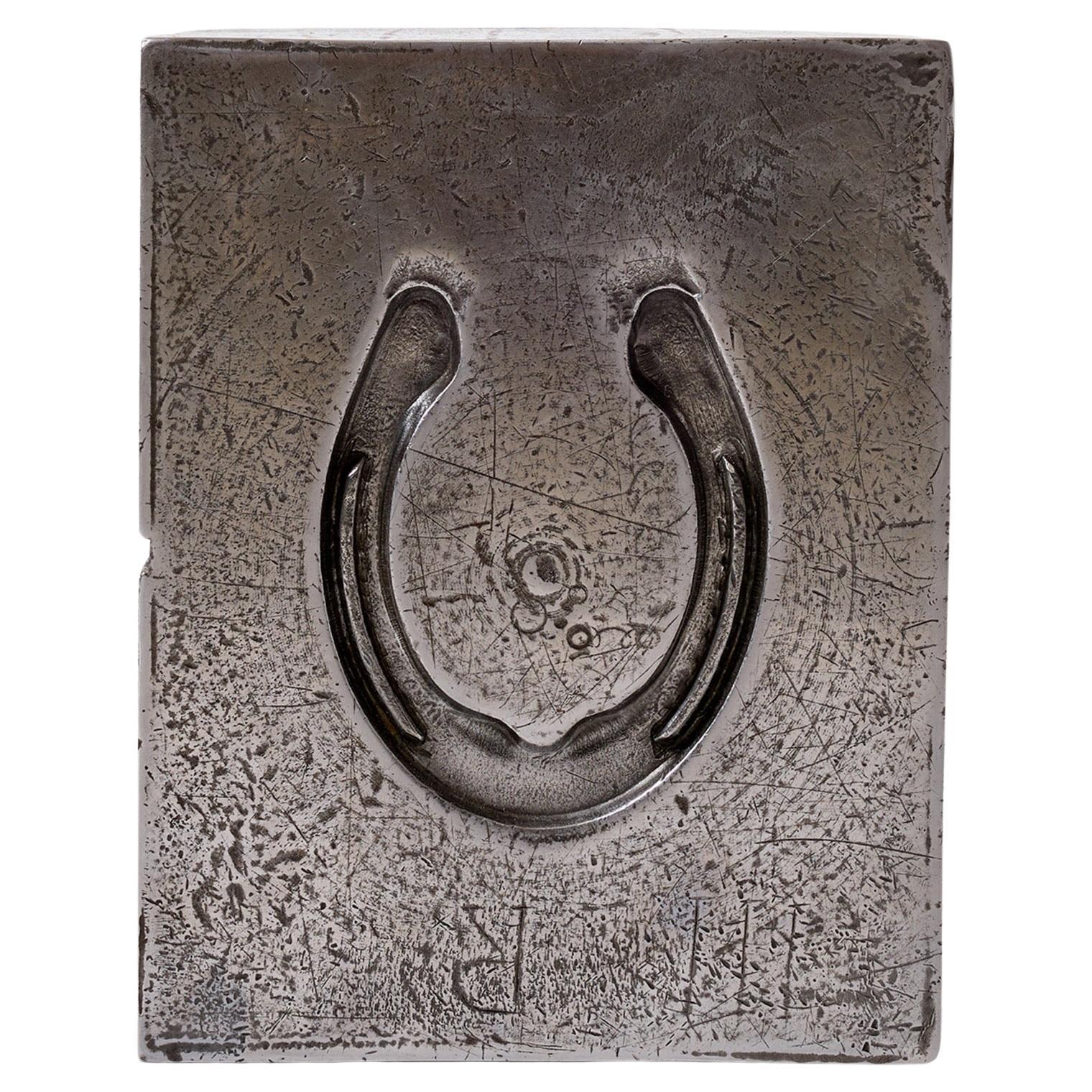 Patinated Steel Horseshoe Mold