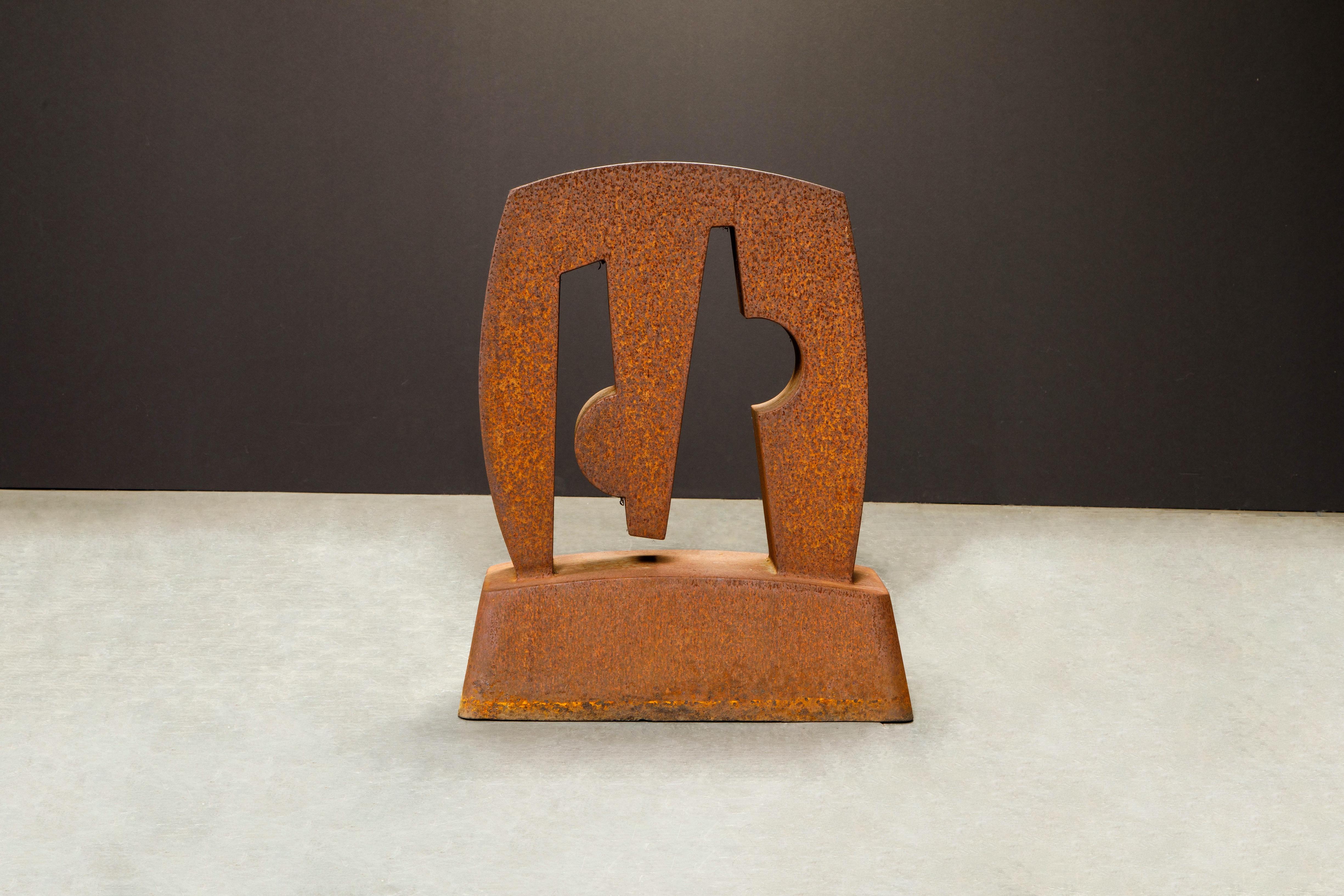 This unique patinated steel sculpture by Arnie Garborg is signed and dated, 1997. A hefty and sizable work of art, this Post-Modern piece can be used indoors or outdoors. 

ABOUT THE ARTIST:
For 12 years Arnie Garborg worked in a studio in
