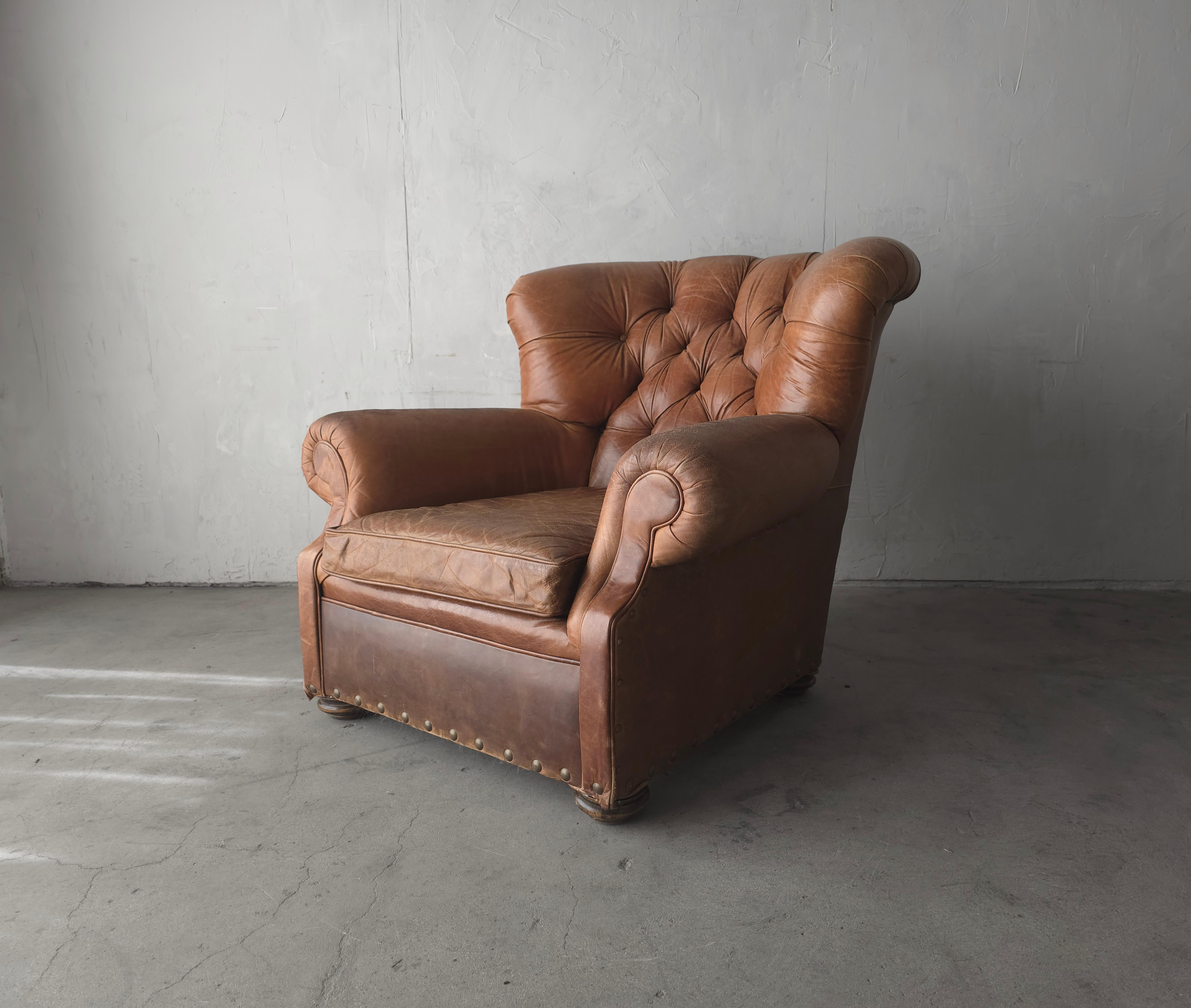 Patinated Tufted Leather Club Chair In Good Condition For Sale In Las Vegas, NV