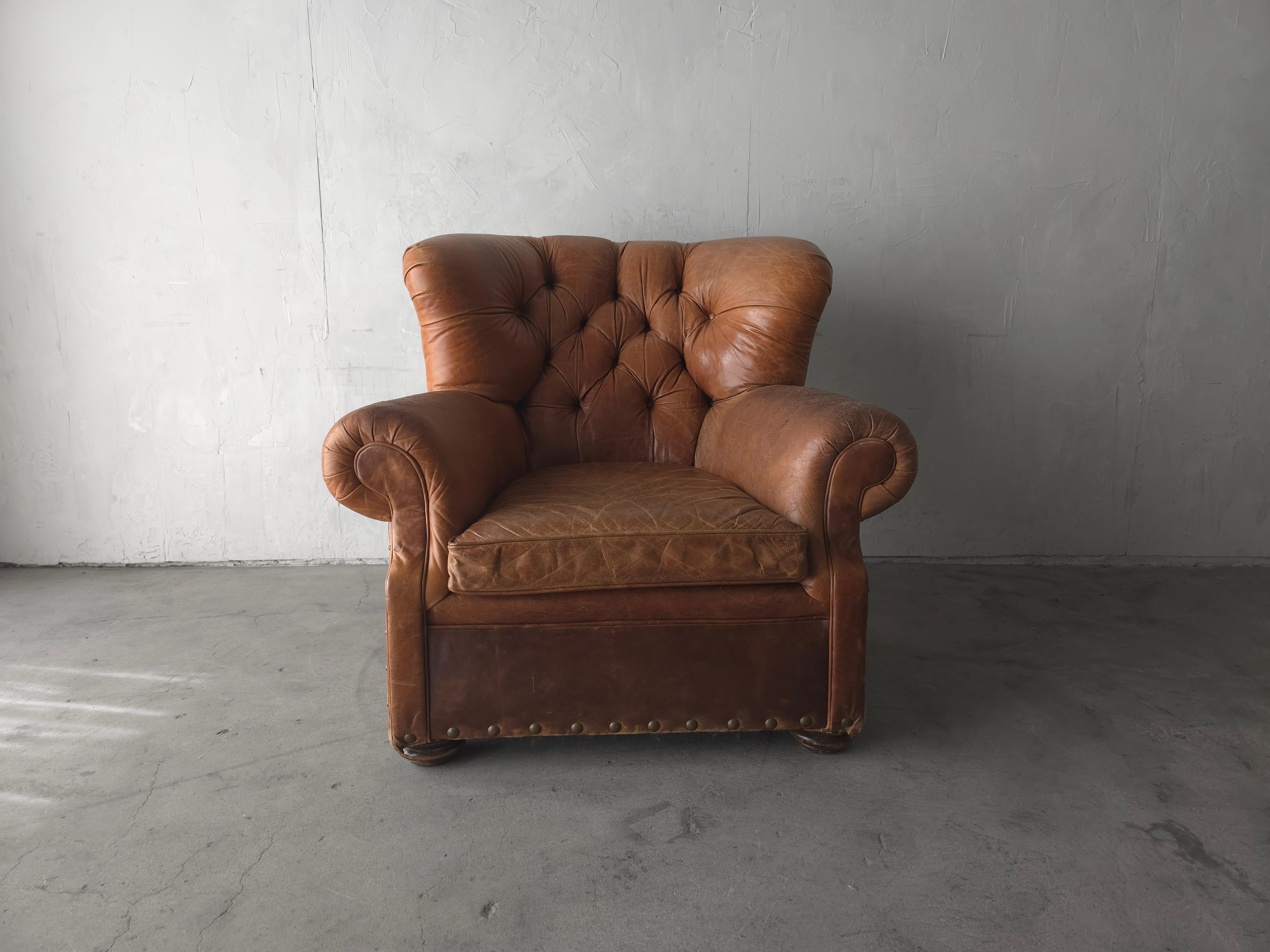 20th Century Patinated Tufted Leather Club Chair For Sale
