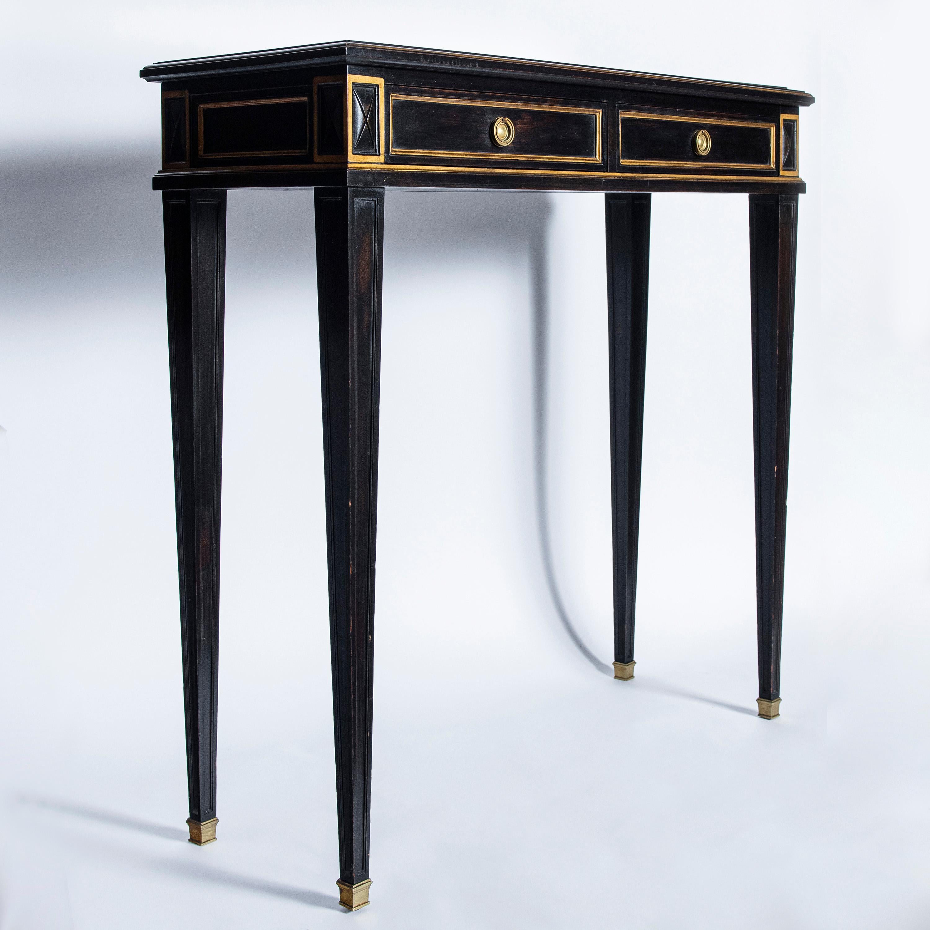 Patinated wood and bronze console with gold leaf glass, France, circa 1950.
Attributed to Maison Jansen.