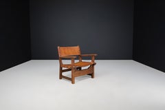 Sedia spagnola in legno patinato e pelle cognac Spagna, anni '60