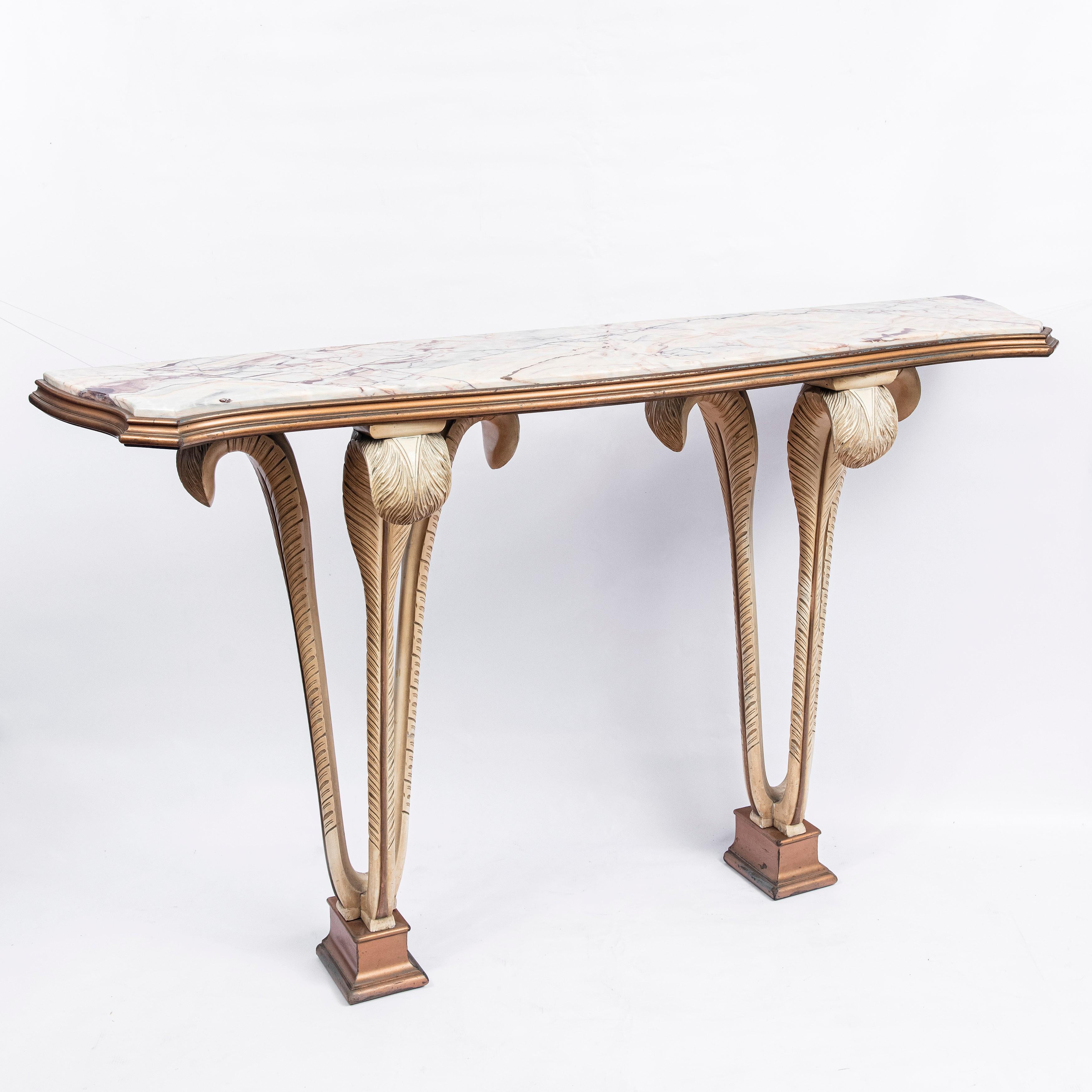 Patinated wood and marble console, France, circa 1950.
Attributed to Maison Jansen.
