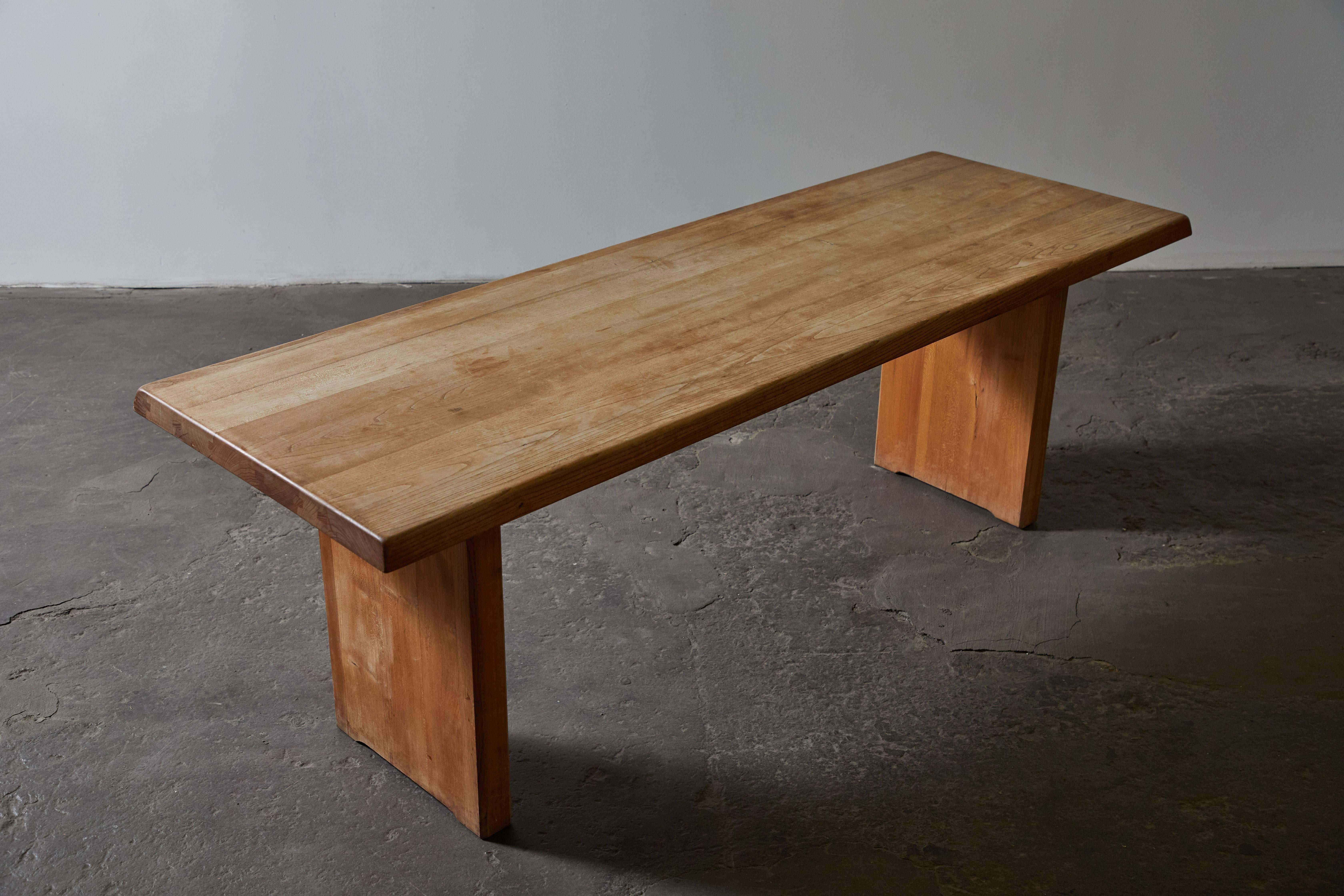 T14D patinated elm dining table by Pierre Chapo, Made in France, circa 1964.