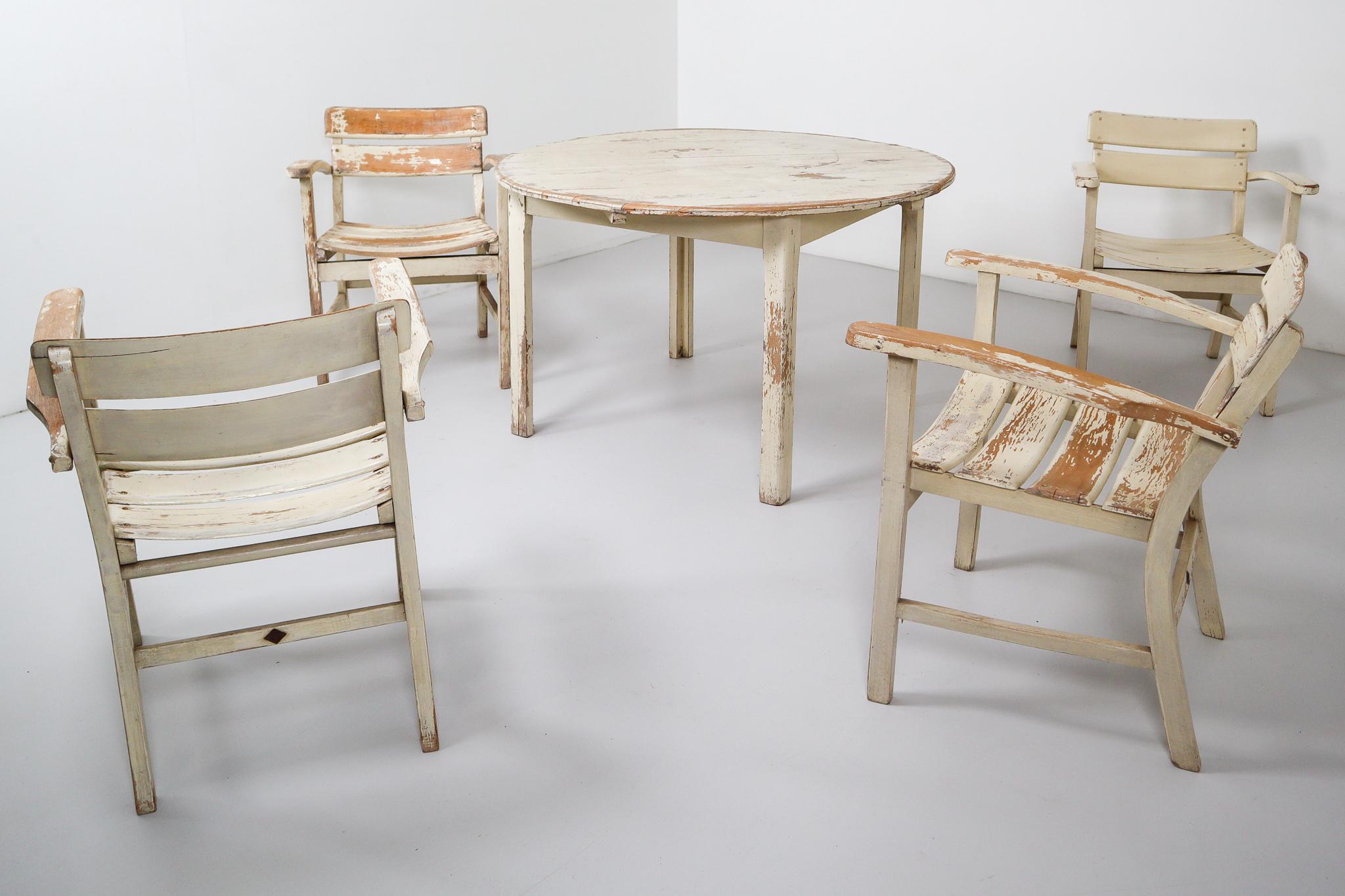 A good quality set of 1930s garden wooden furniture set by Heinrich Hammer. Comprised of a four chairs and a dining table. 

Measures: Table: H 69cm x W 115cm x D 115cm
Chair: H 75cm x W 52cm x D 62 x SH 42cm.
 