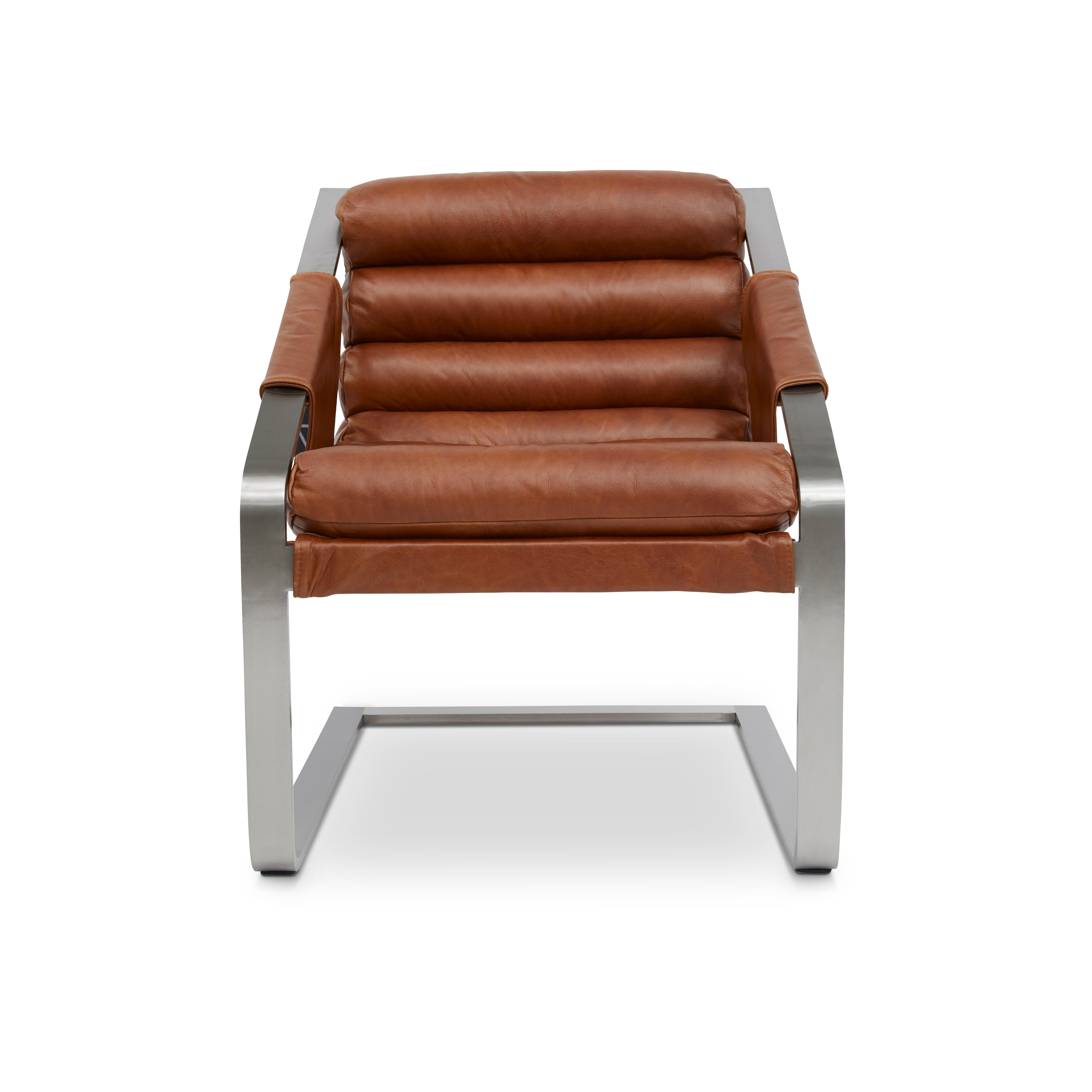 The Patine Chair infuses cool modern metal with the finesse of a past era. With its plush channeled design, the rolls are loved for the comfort and the chic contrast of rich leather with solid stainless steel.

Features
- Fashioned in a stunningly