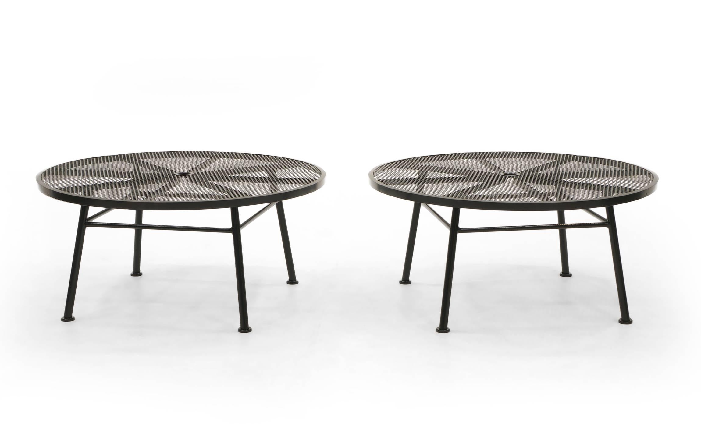 Outdoor coffee tables by Russell Woodard. There is a pair in the listing, but price is for each. These have been expertly media blasted and powder coated in a smooth satin black finish.