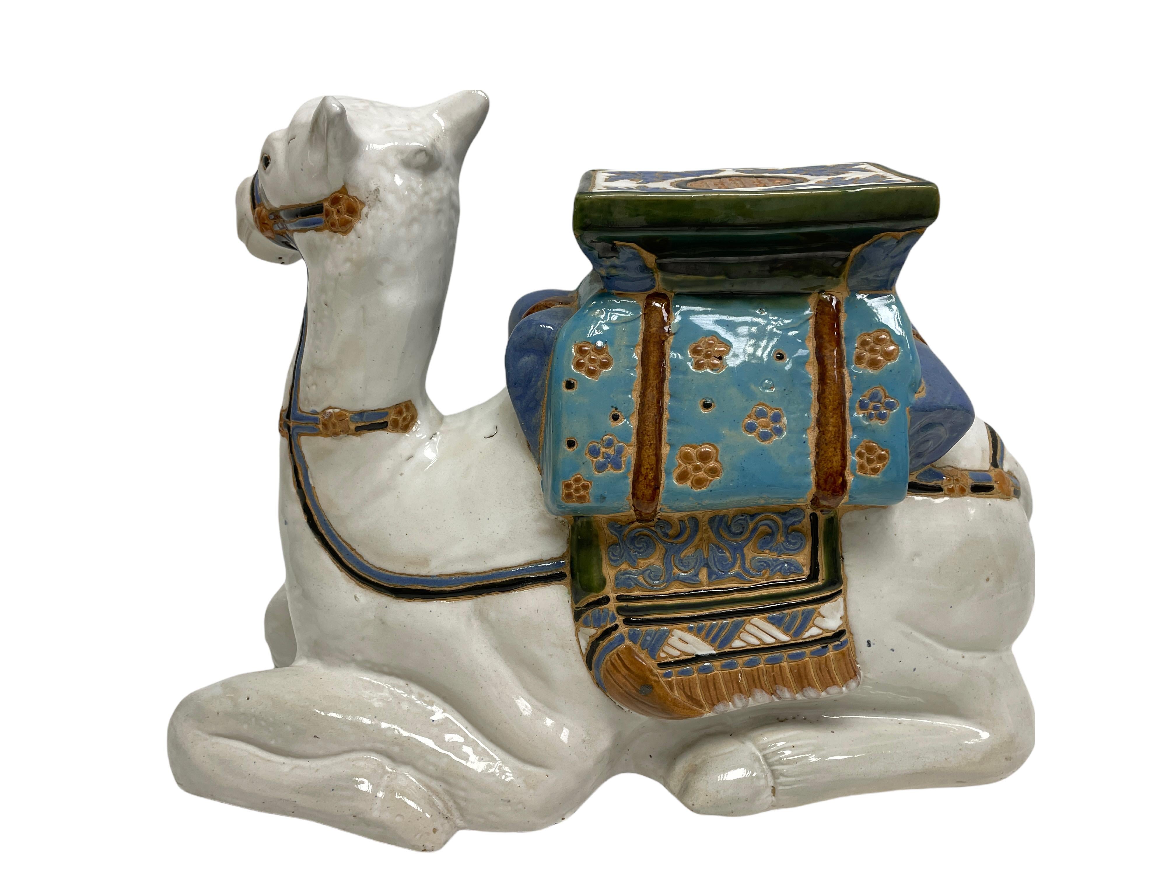 Mid-20th century glazed ceramic camel garden flower pot stand. Handcrafted ceramic. Nice addition to your home, patio or garden area.
     