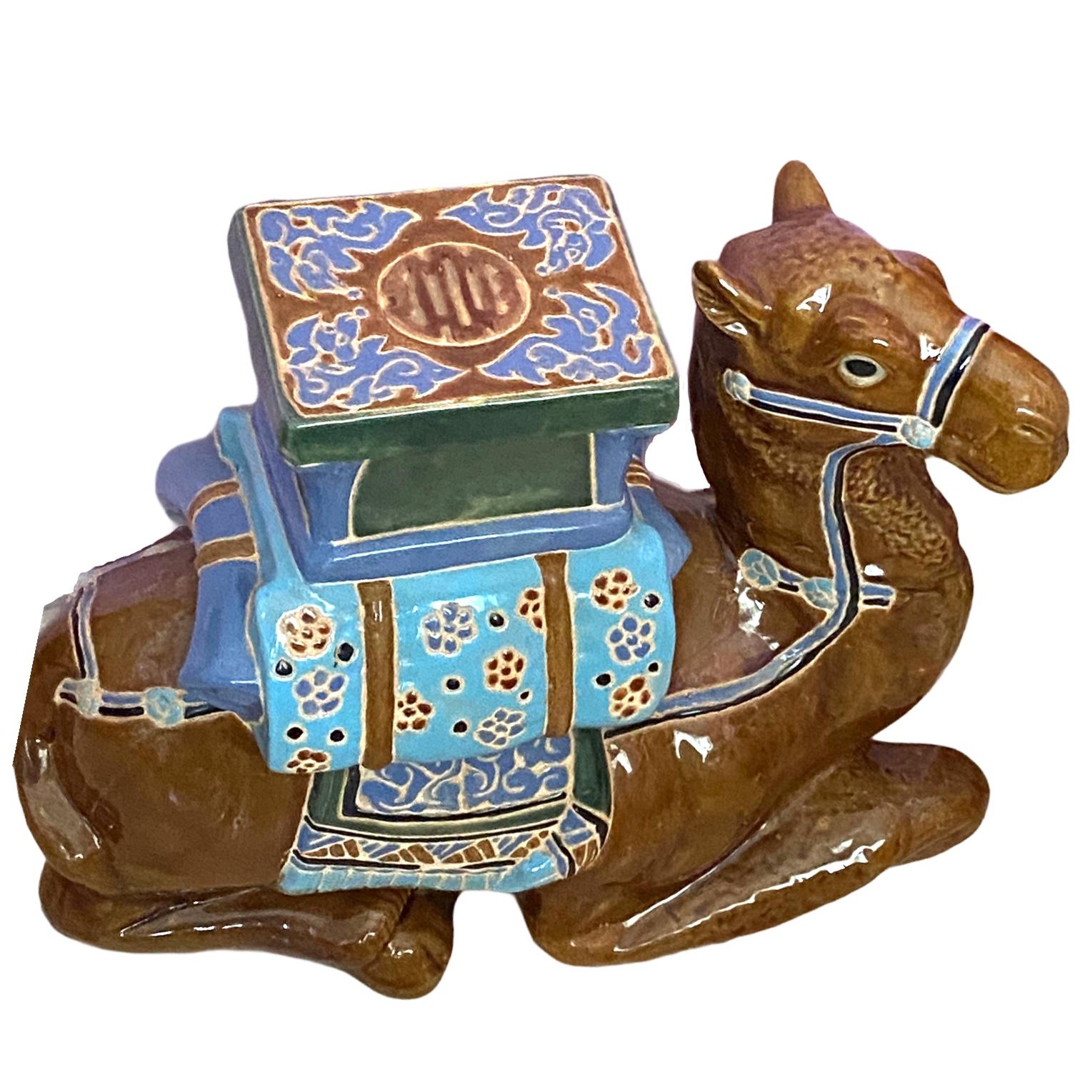 Mid-20th century glazed ceramic camel garden stool, flower pot seat or side table. Handcrafted ceramic. Nice addition to your home, patio or garden area.
 