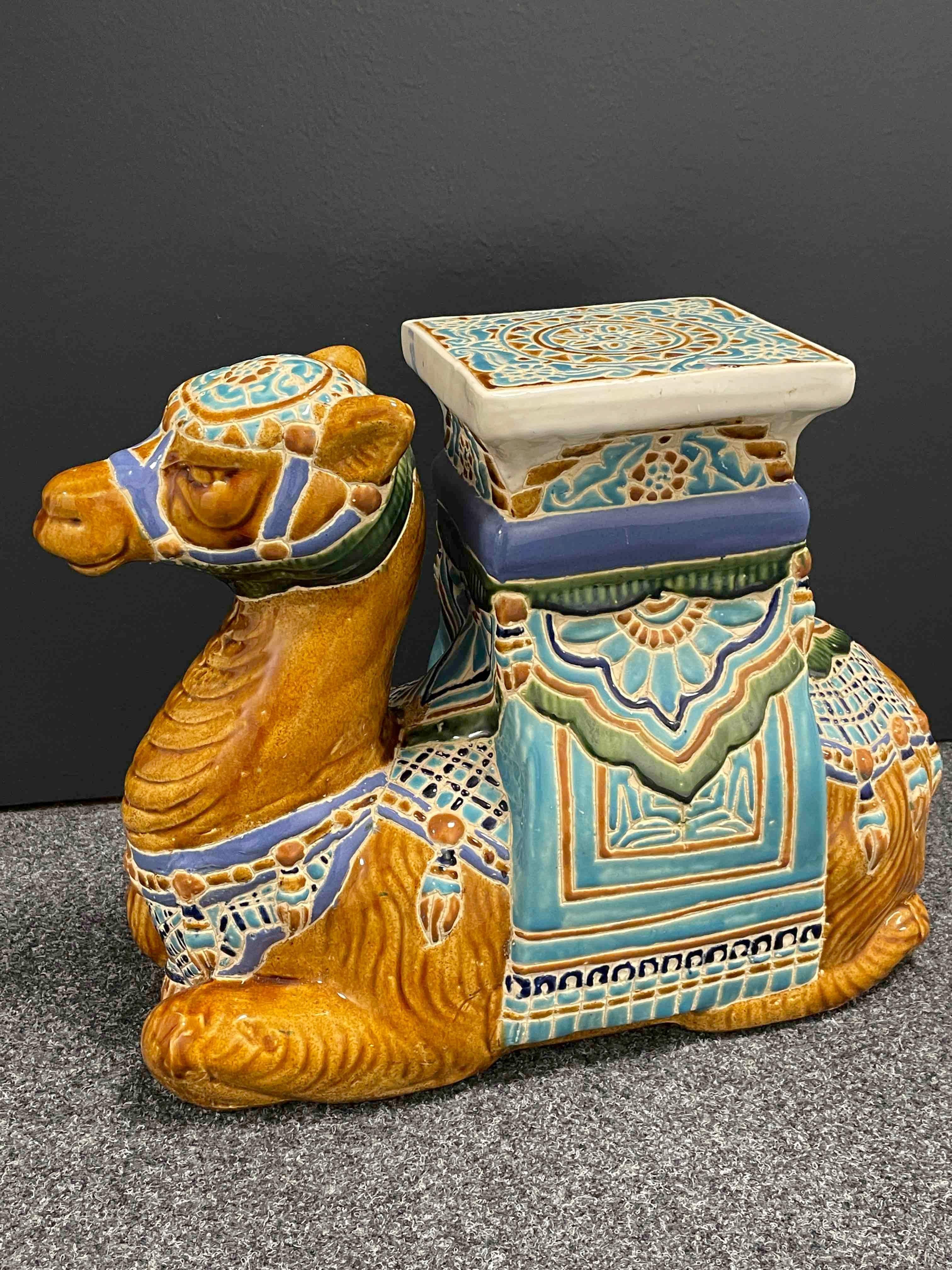 Mid-20th century glazed ceramic camel garden stool, flower pot seat or side table. Handcrafted ceramic. Nice addition to your home, patio or garden area.
     