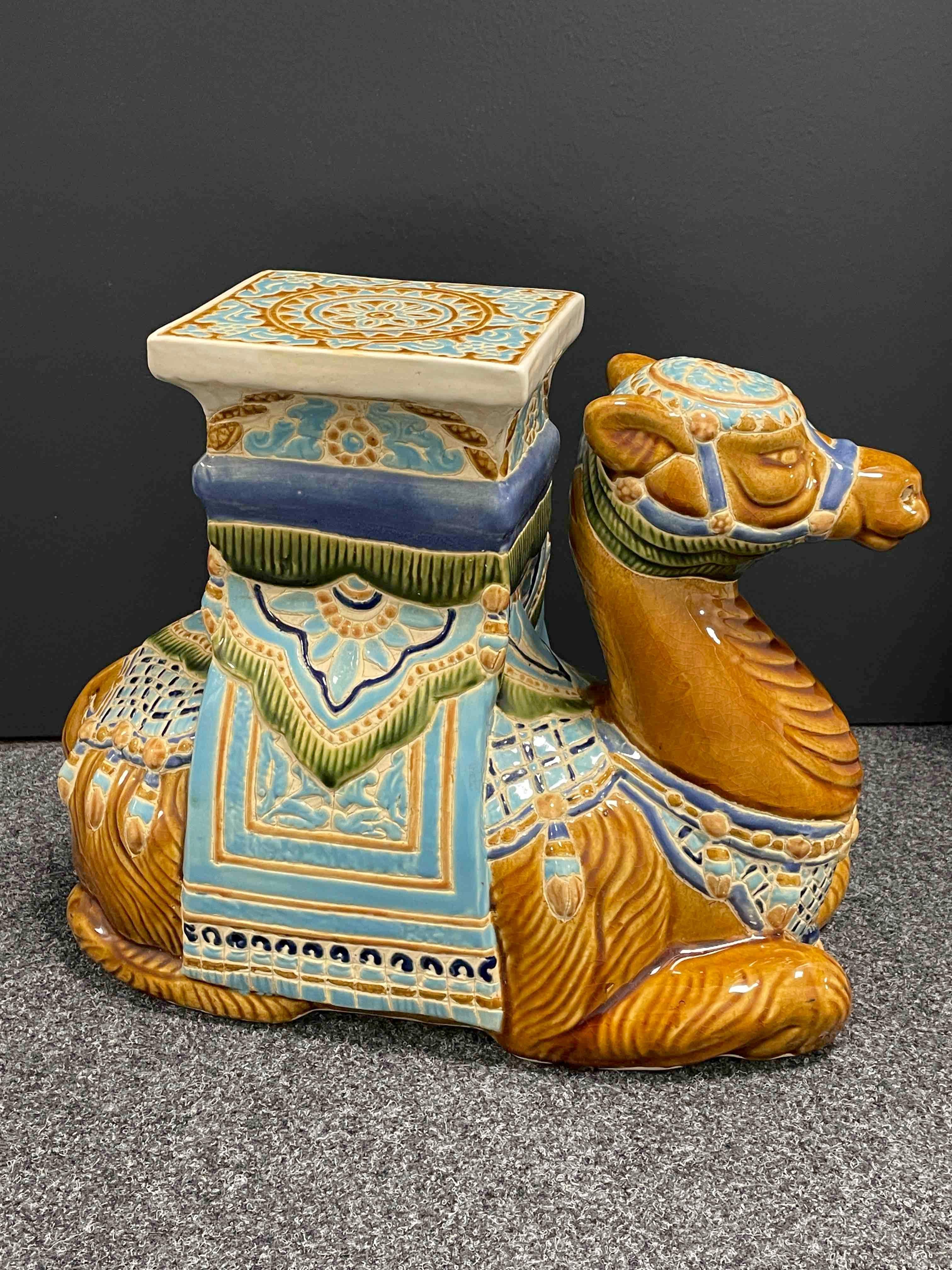 Mid-20th century glazed ceramic camel garden stool, flower pot seat or side table. Handcrafted ceramic. Nice addition to your home, patio or garden area.
 
