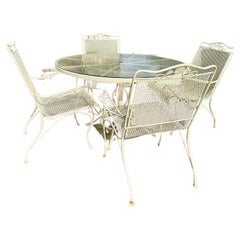 Patio Set by Woodard, Salterini Collection, 48" D. table and 4 dining armchairs
