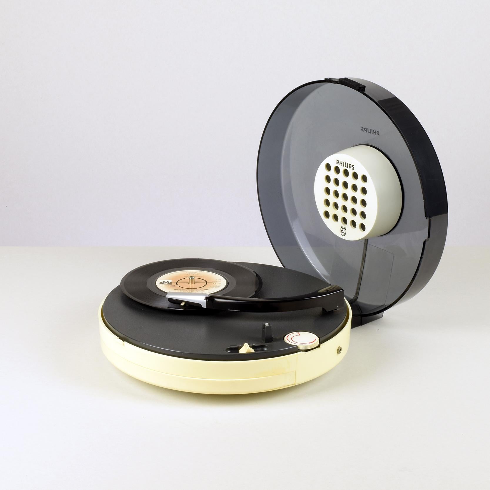 Patrice Dupont (designer)
Philips (manufacturer)

22 GF 303 'UFU' portable record player, designed, circa 1969.

White/cream plastic case with clear smoked plastic lid, dark grey plastic interior.

Plays 7” and 12” records, 33 and 45 speeds.