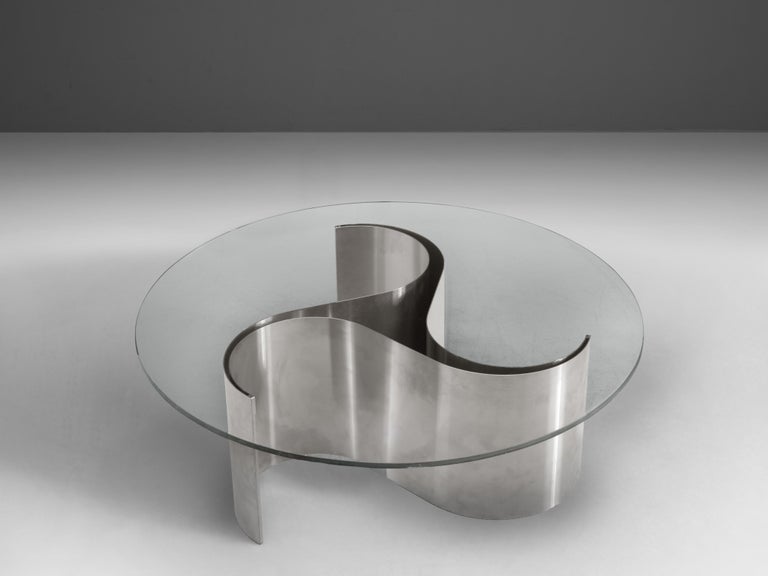 Patrice Maffei for Kappa, coffee table 'Comète', glass, steel, France, 1970s

The 'Comète' coffee table by French designer Patrice Maffei shows a dynamic base made out of steel. Due to the visual characteristics the stainless steel the shape has an