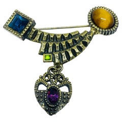 Spilla vintage firmata PATRICIA LOCKE, in metallo dorato con pietre in vetro