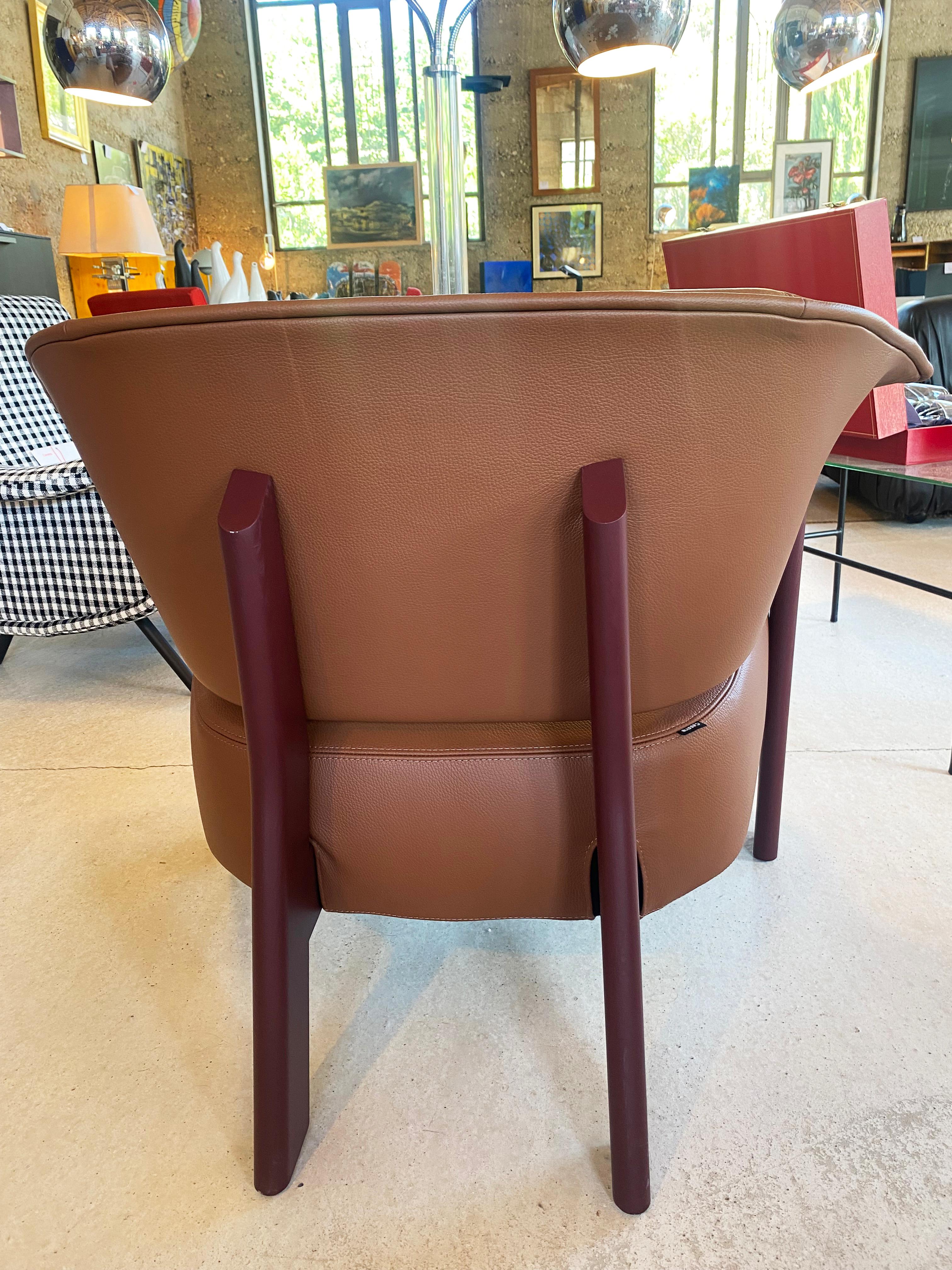 Patricia Urquiola
Back Wing” armchair
Cassina Edition
Canaletto walnut
and natural 360 leather
new
L 91 × l 73 × h 69 cms

Ref : PMY24
5980 € → 2900 €
571 Back-Wing Armchair - Canaletto Walnut / 360 Natural Leather
571 Back-Wing is an armchair