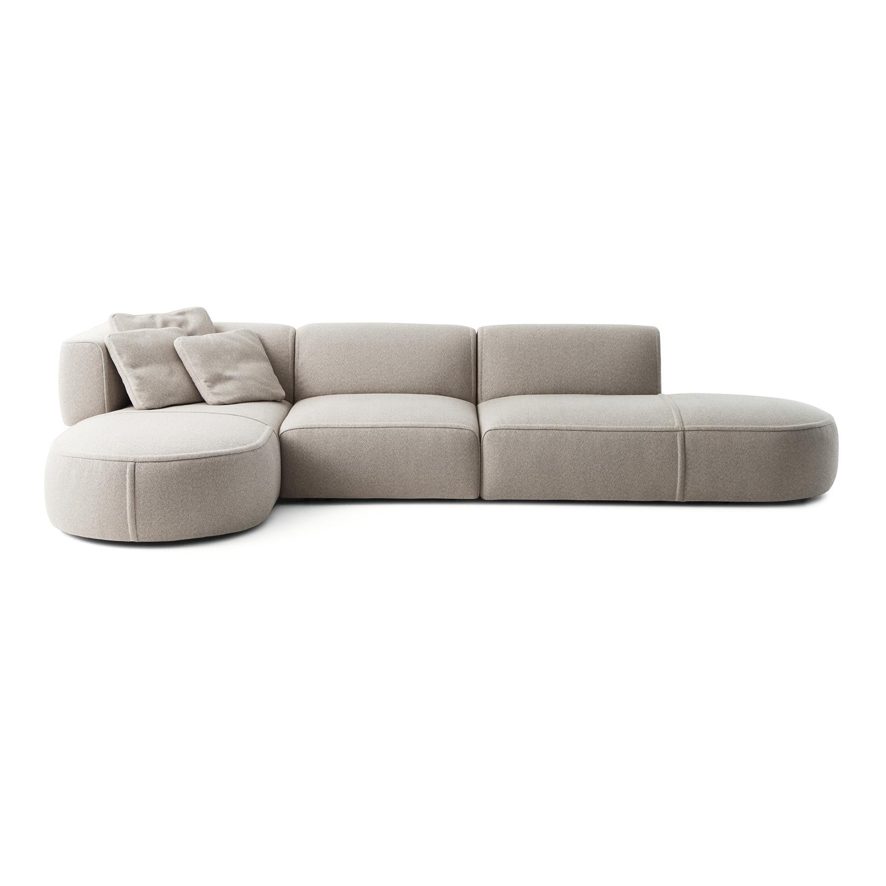 Modular sofa designed by Patricia Urquiola in 2018. Manufactured by Cassina in Italy.

An inventive modular sofa, with soft, inviting curves that bespeak comfort to the max and extreme versatility. The rounded arm-rests curve to meet the back, the