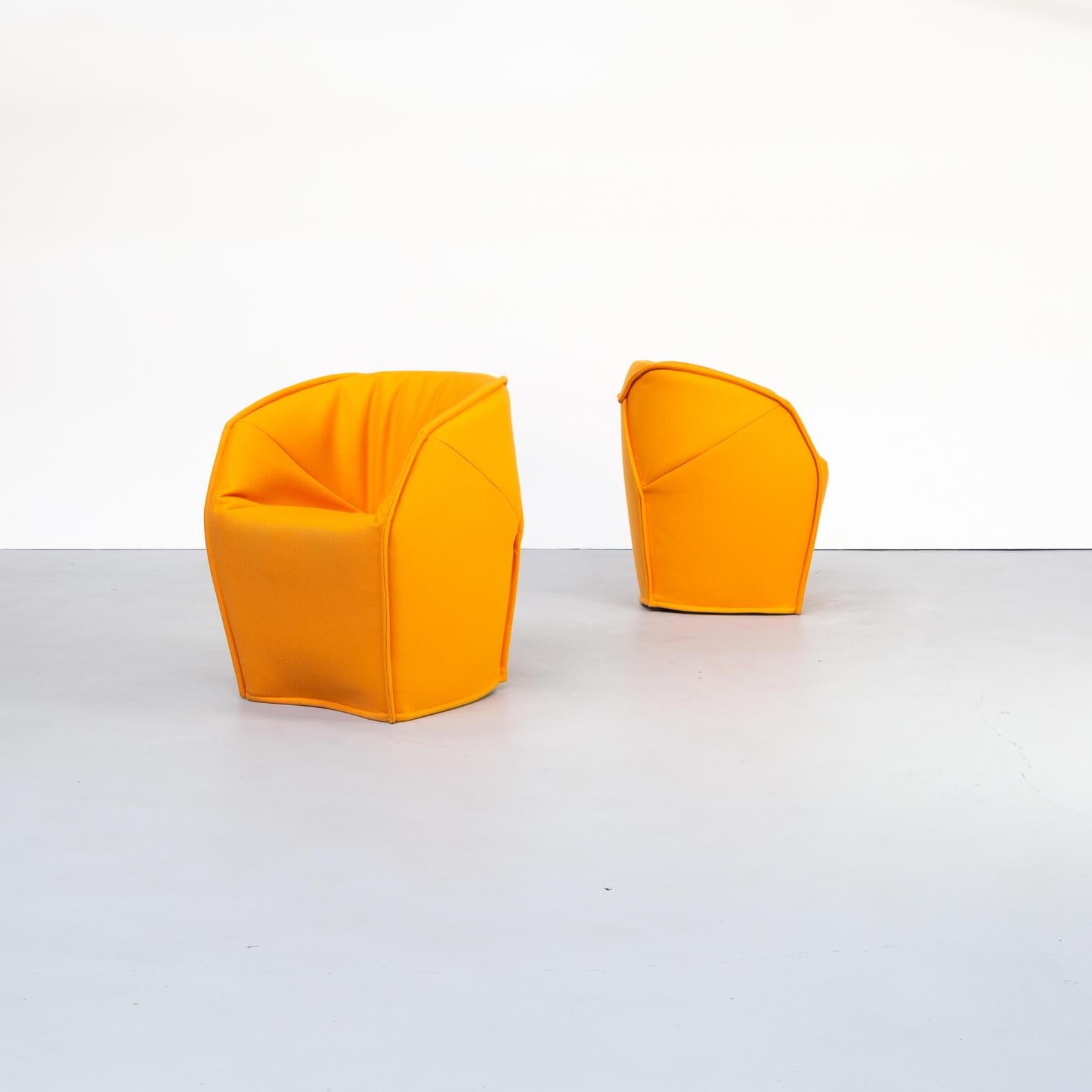 M.a.s.s..a.s stands for ‘Moroso Asymmetric Sofa System Adorably Stitched’. Patricia Urquiola:
Blunt blocks rounded and smoothed by some imaginary blade. Geometric order is broken, swept away by a movement, a line which follows the contour. The