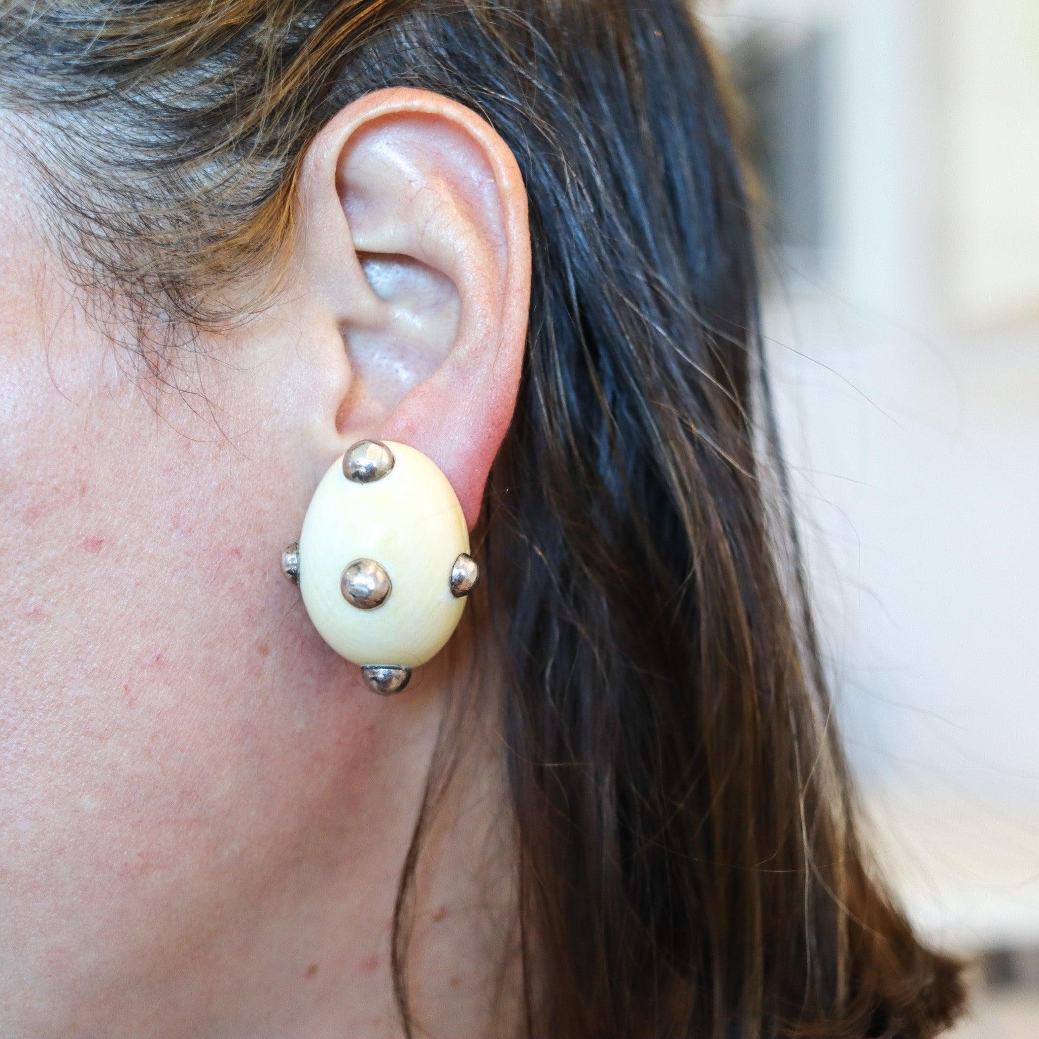 Modernist sculptural earrings designed by Patricia Von Musulin.

This is a fabulous pair of clips-on earrings, created during the modernist period in New York city by the jewelry designer Patricia Von Musulin, back in the 1970. The beautiful