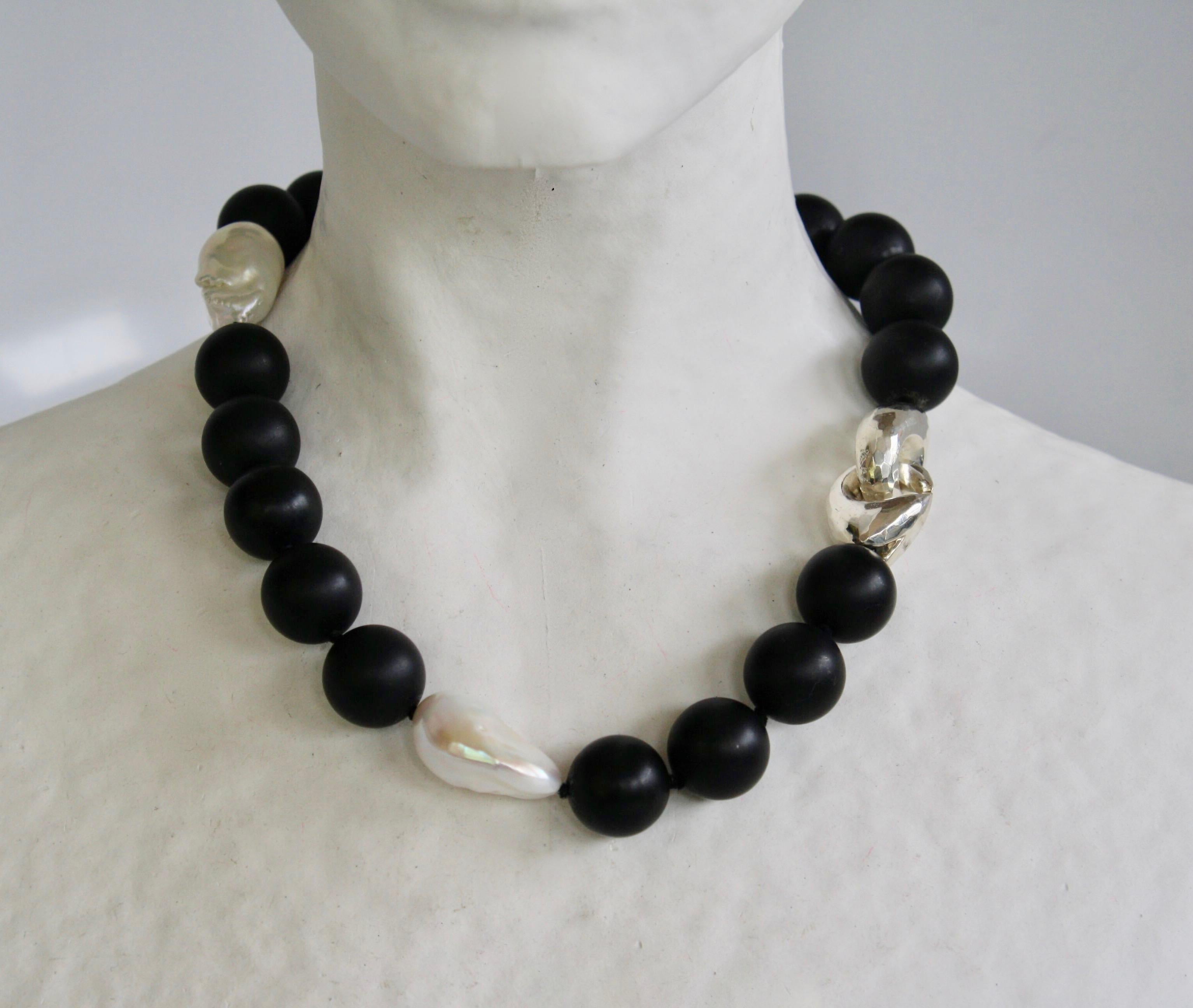 Black onyx and baroque pearl choker necklace with solid sterling silver clasp from Patricia von Musulin. 