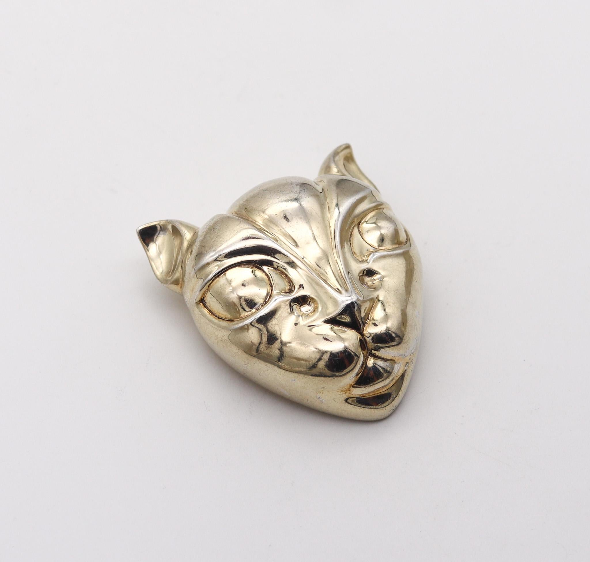 Geometric cat brooch designed by Patricia Von Musulin.

Stunning pendant-brooch, created in the shape of a geometric cat by Patricia Von Musulin during the modernist period, back in the late 1970. The brooch was carefully crafted in solid .925/.999