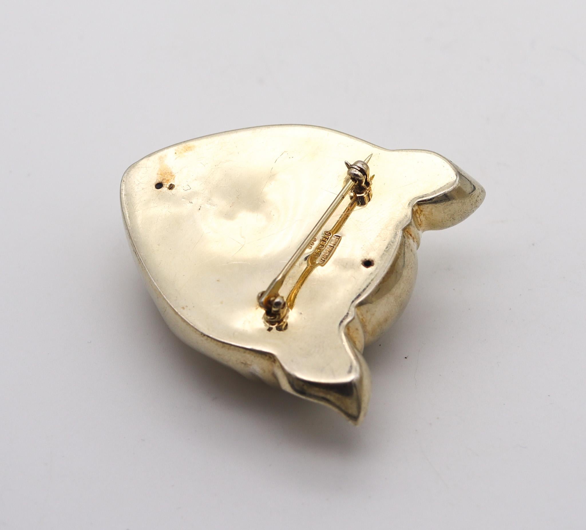 brooch with face