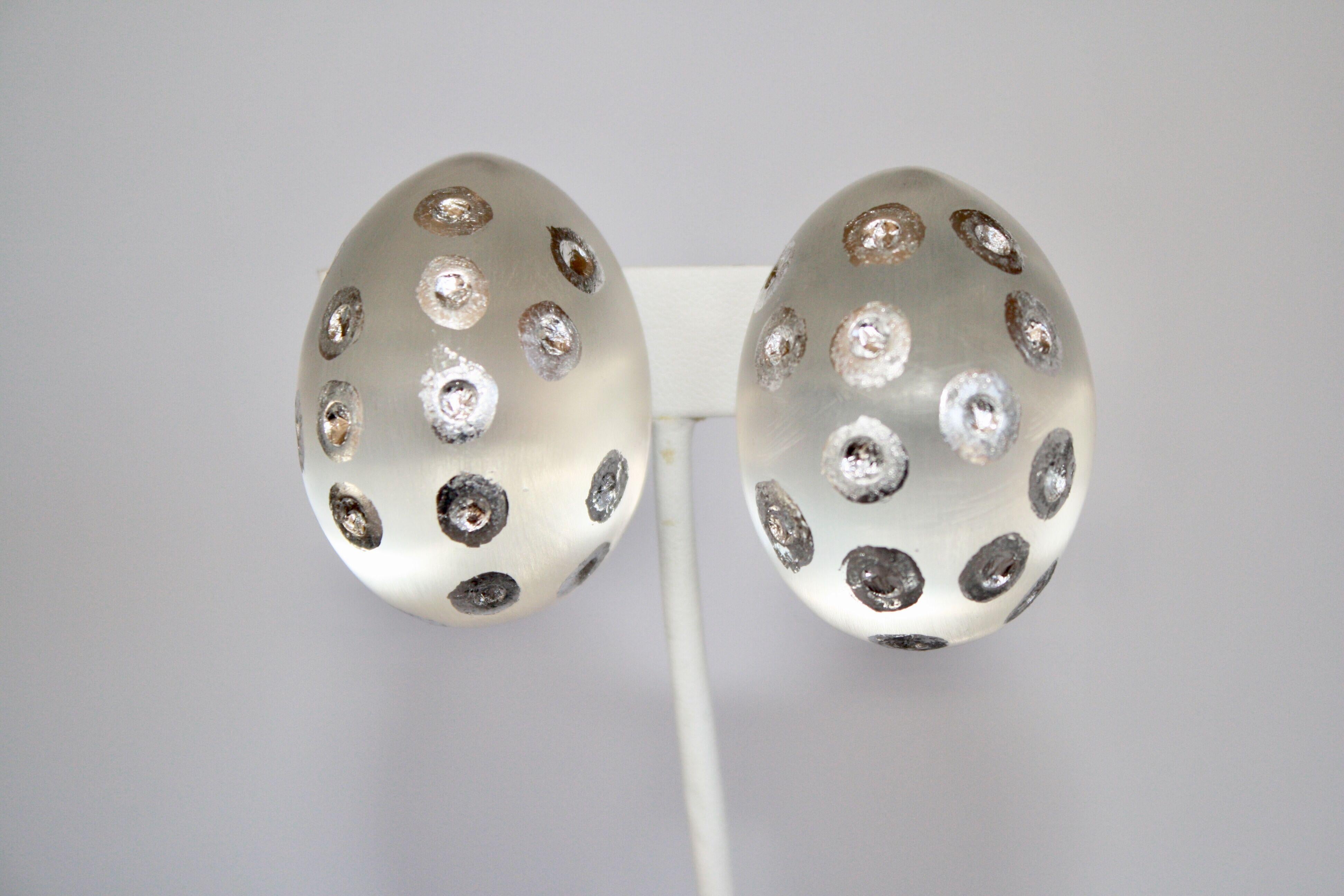 Frosted lucite clip earrings with sterling silver dots from Patricia von Musulin. 