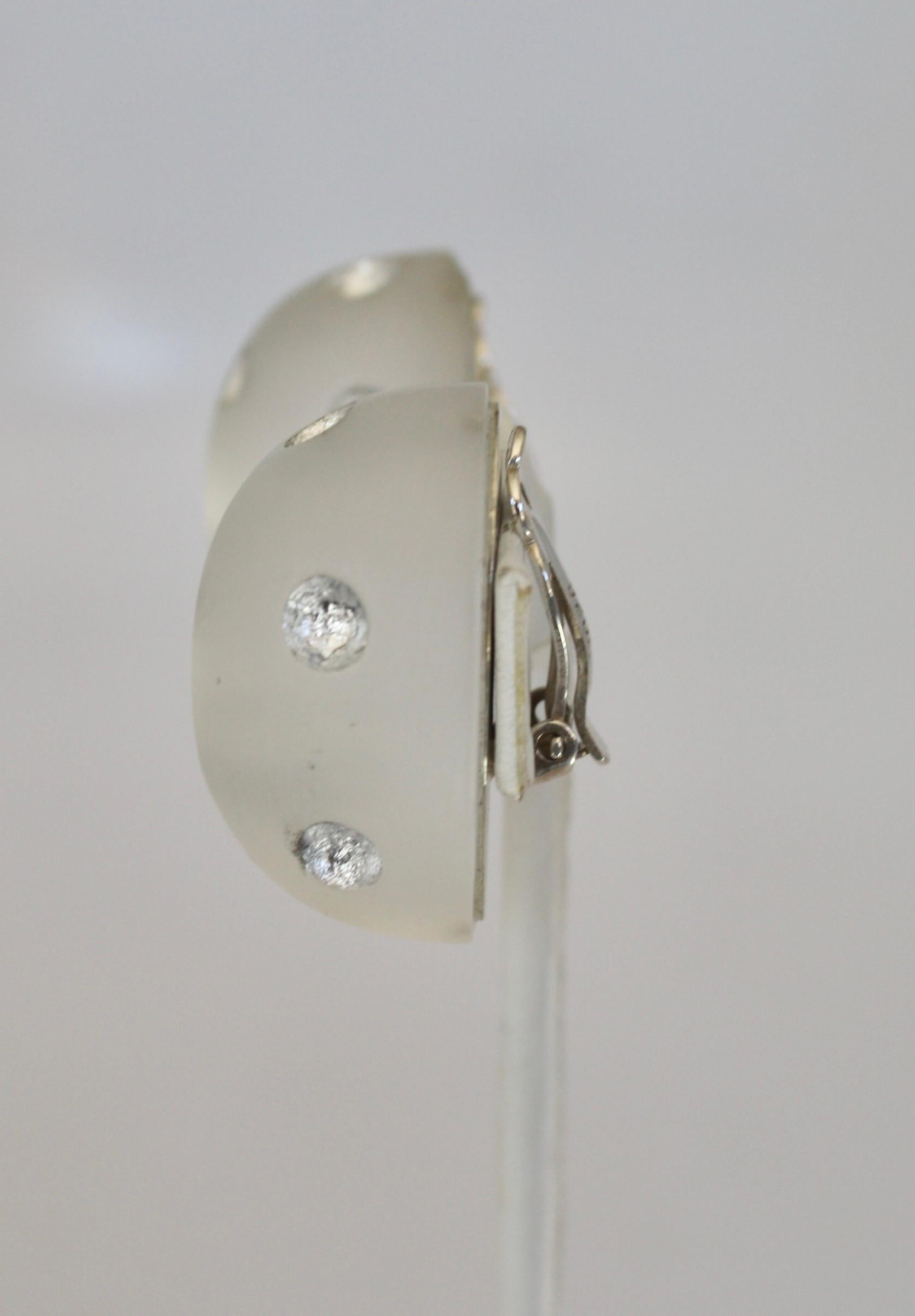 Frosted lucite and sterling silver dot small size clip earrings from Patricia von Musulin. 