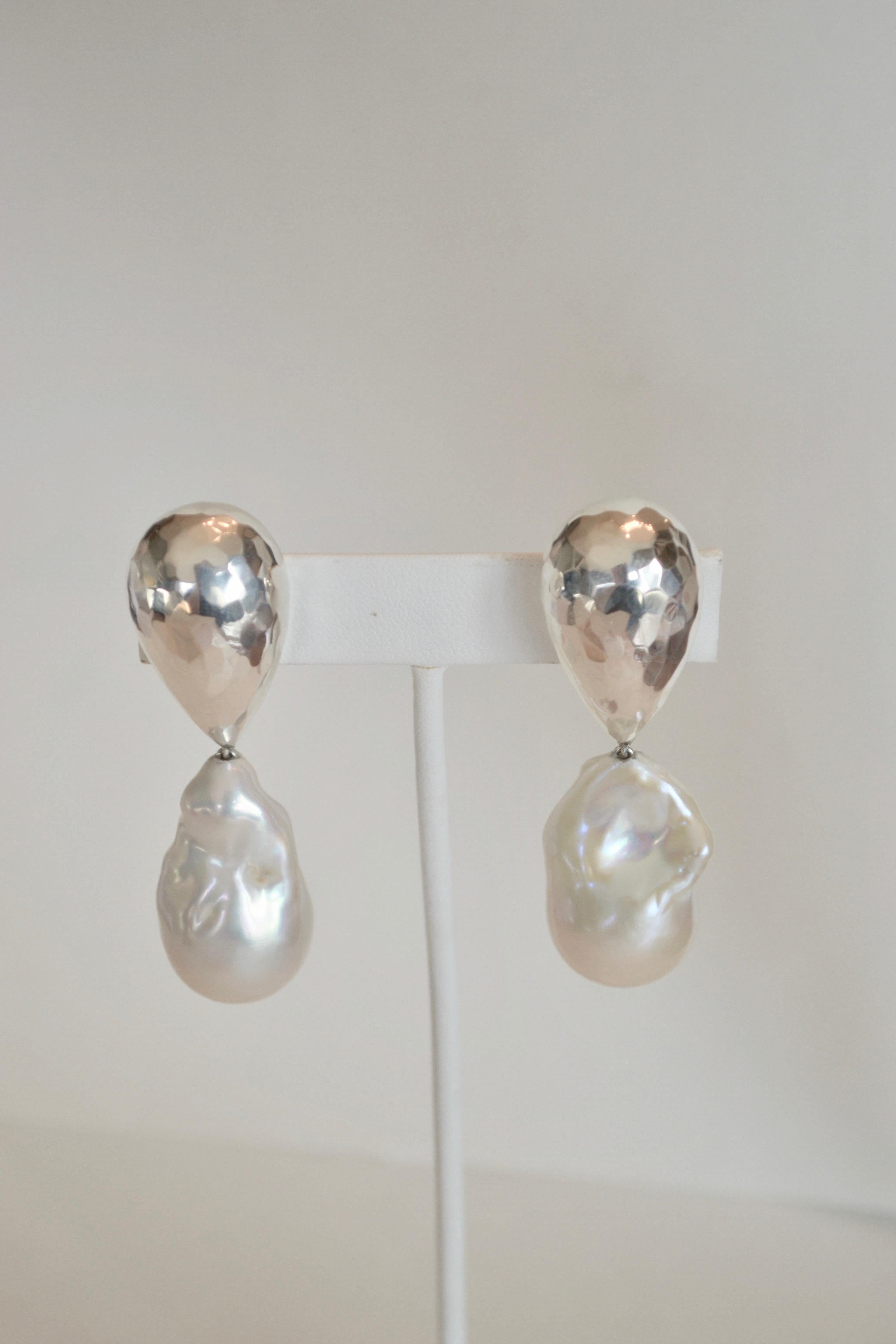 Hammered Sterling Silver top and white baroque pearl drop clip earrings from Patricia von Musulin. 