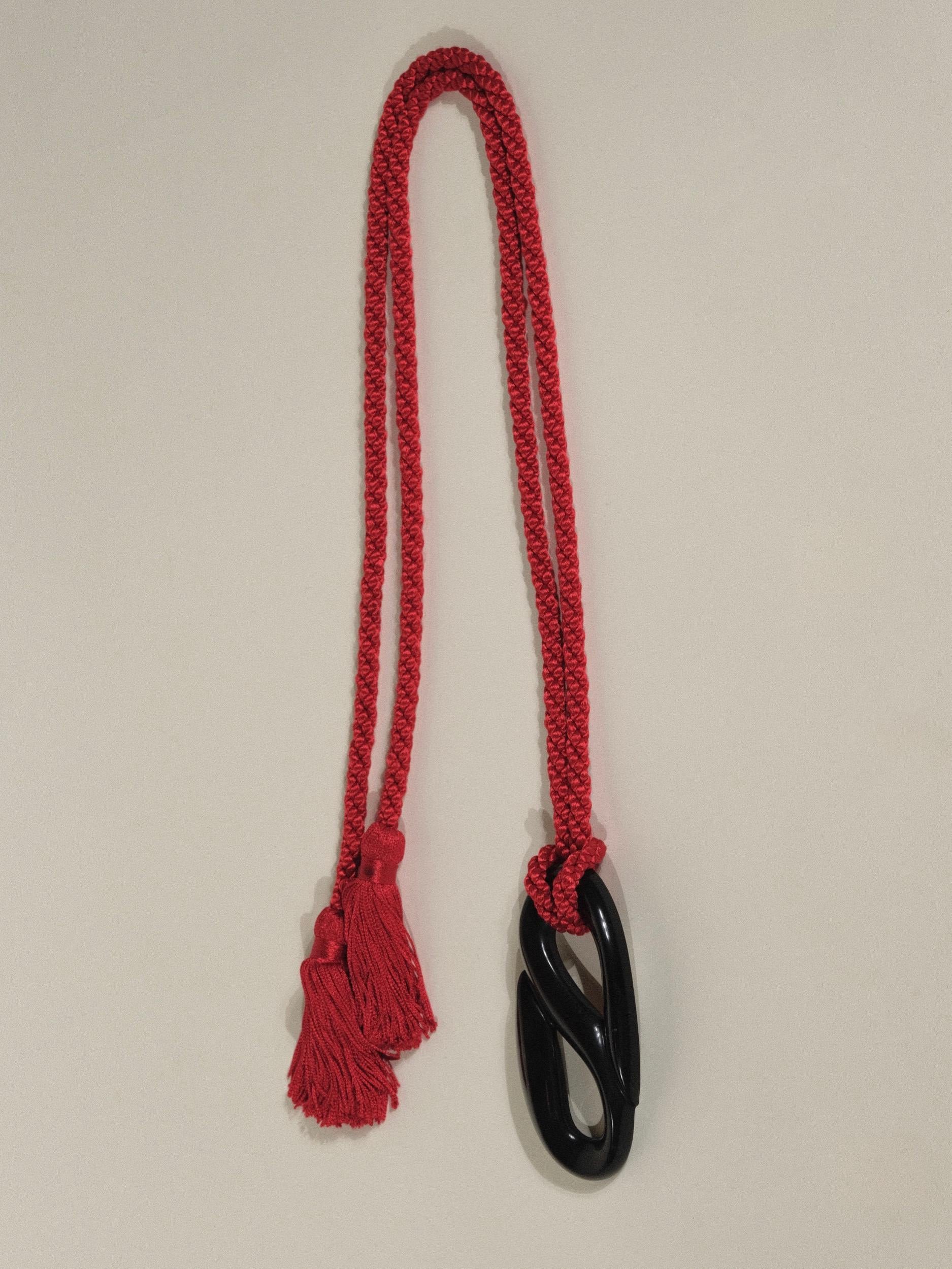 Tassel Rope Belt by Patricia von Musulin
Sculptural Lucite with Red Woven Tassel
Signed 