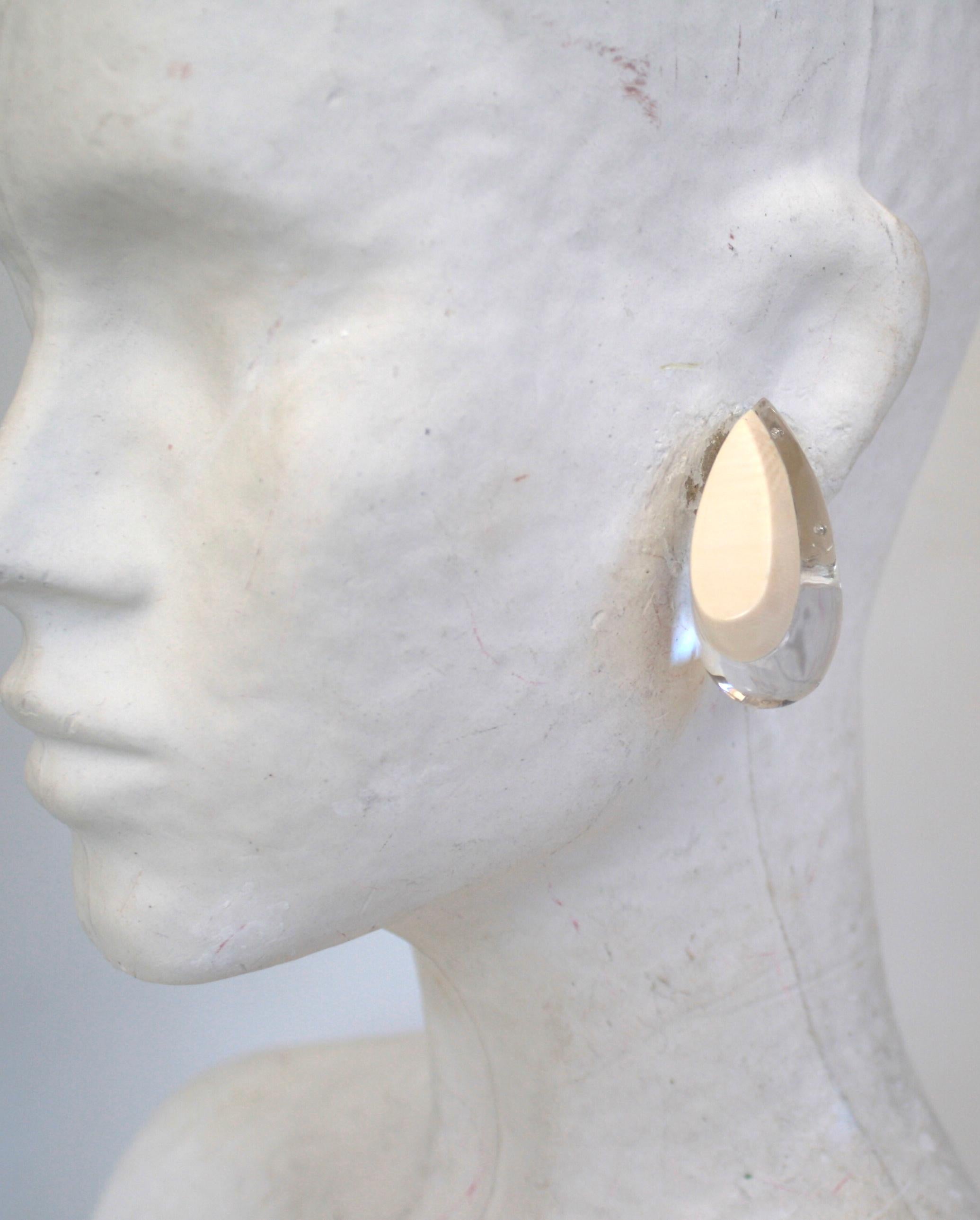 Hand carved white coral and lucite tear drop clip earrings from Patricia von Musulin's newest collection. 