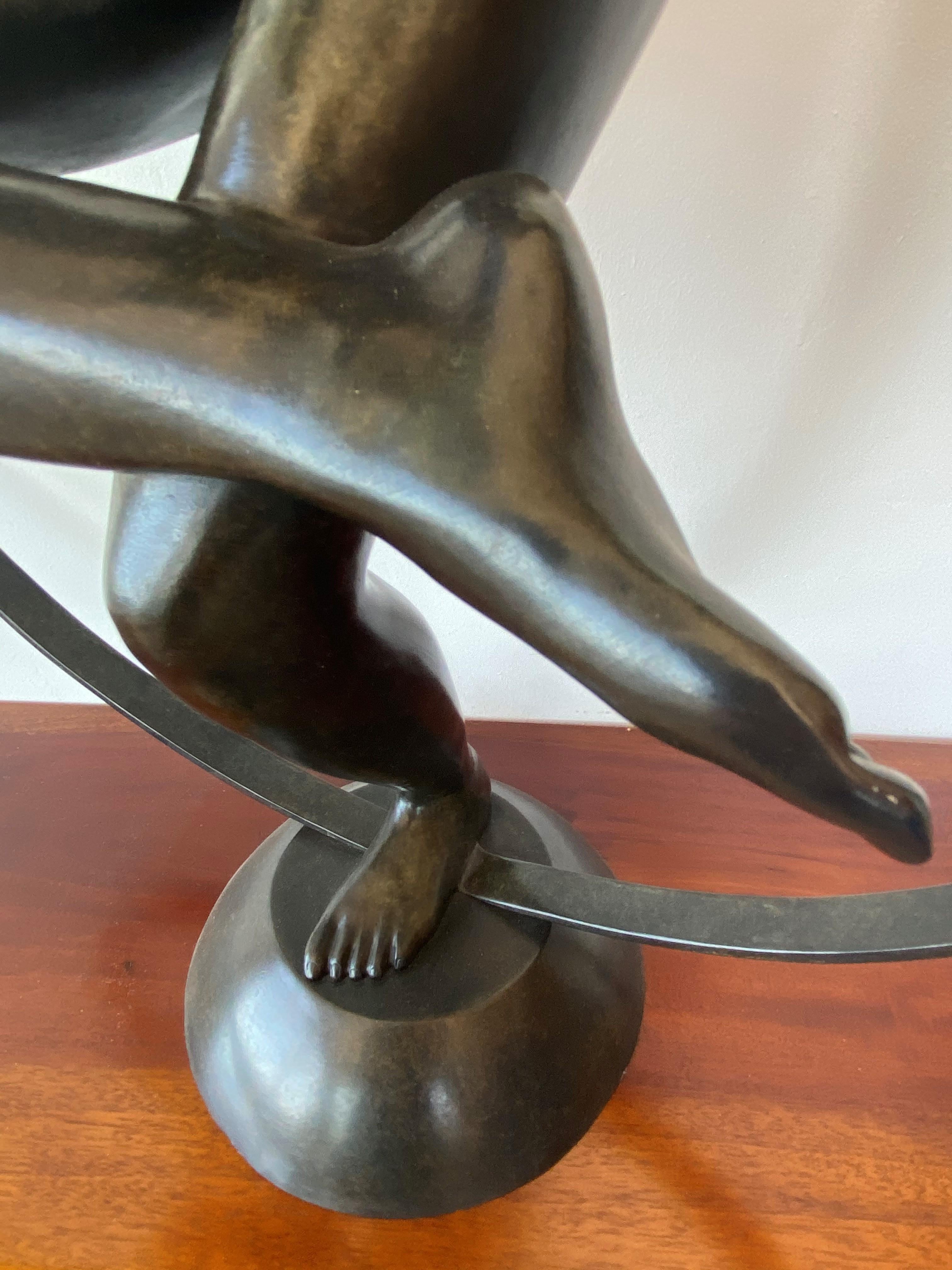 Taking Off - Gold Figurative Sculpture by Patrick Brun