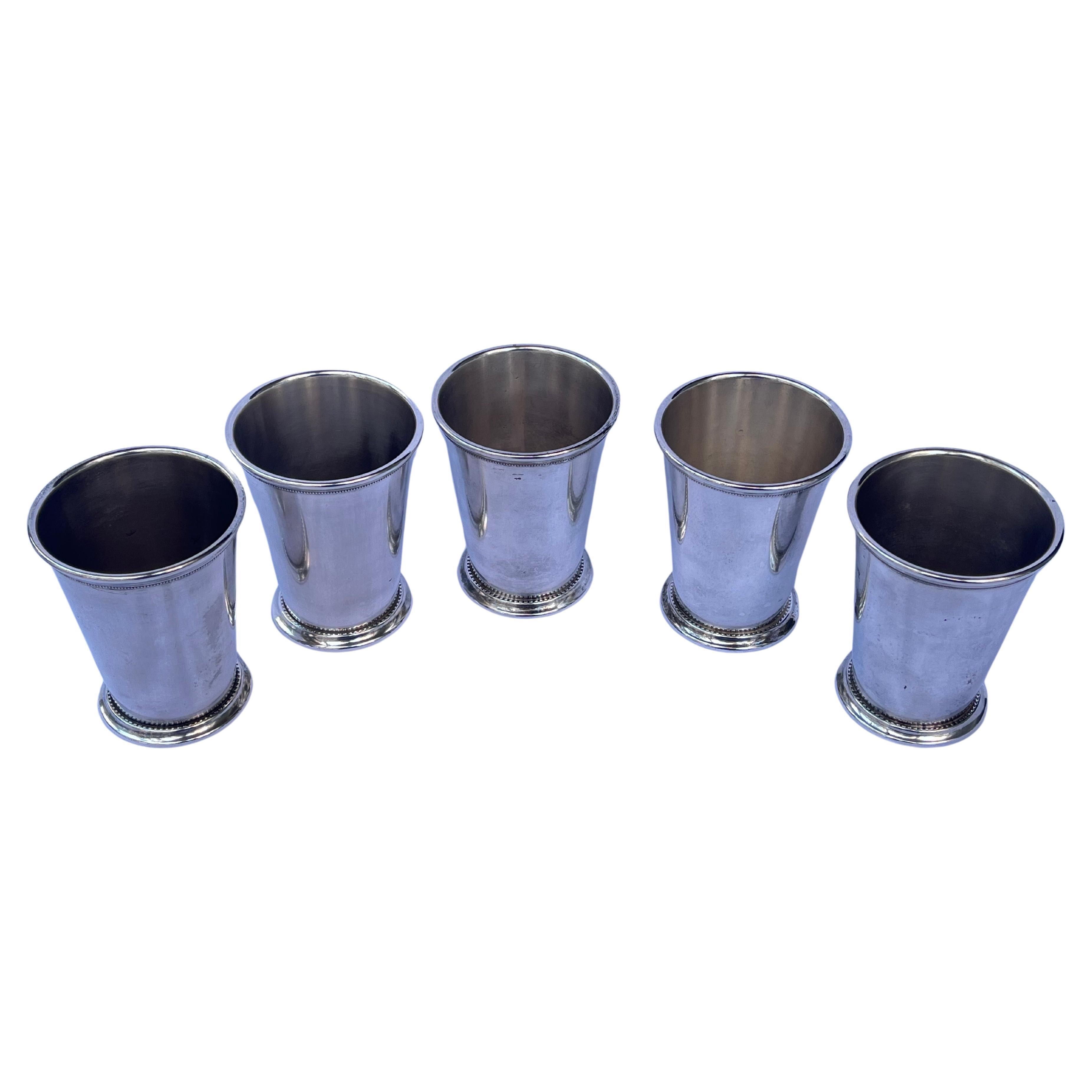 A vintage assembled set of five Italian made Patrick Henry Mint Julep Cups. This vintage set of five cups is the perfect addition to your home bar for everyday cocktails, not just the Mint Julep on May 7th for the Kentucky Derby! But if you'd like