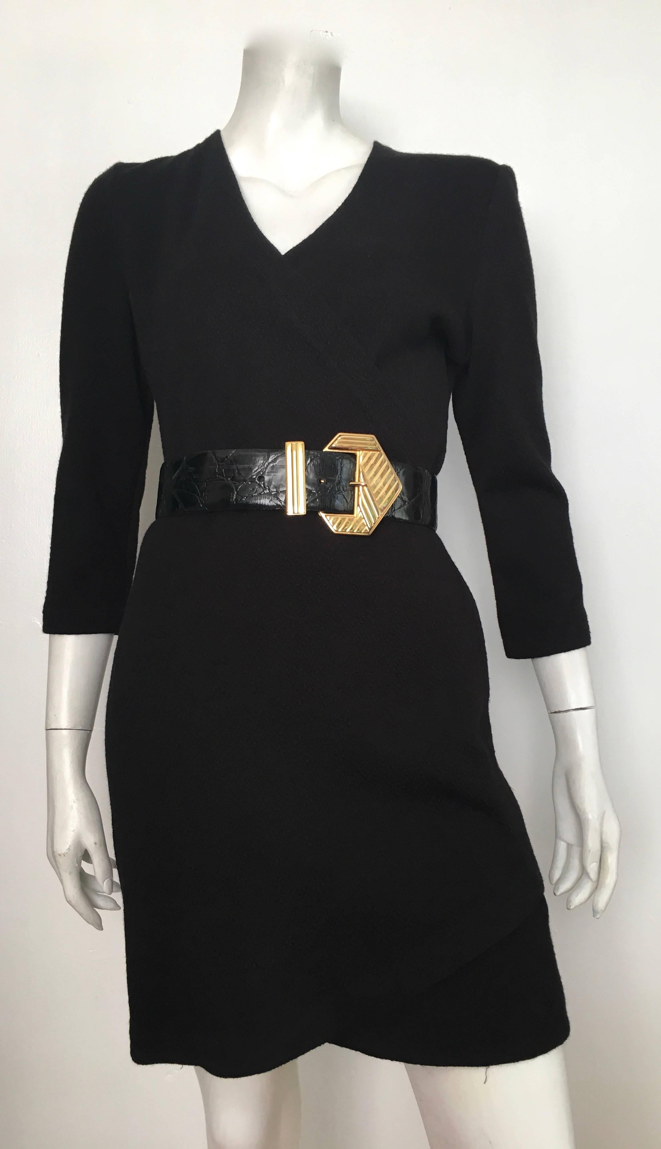 Patrick Kelly Paris 1980s classic little black dress will fit a size 6 / 8.  Ladies to make sure this dress will fit your lovely body please grab your tape measure and measure your bust, waist & hips to make certain this will fit your body if are