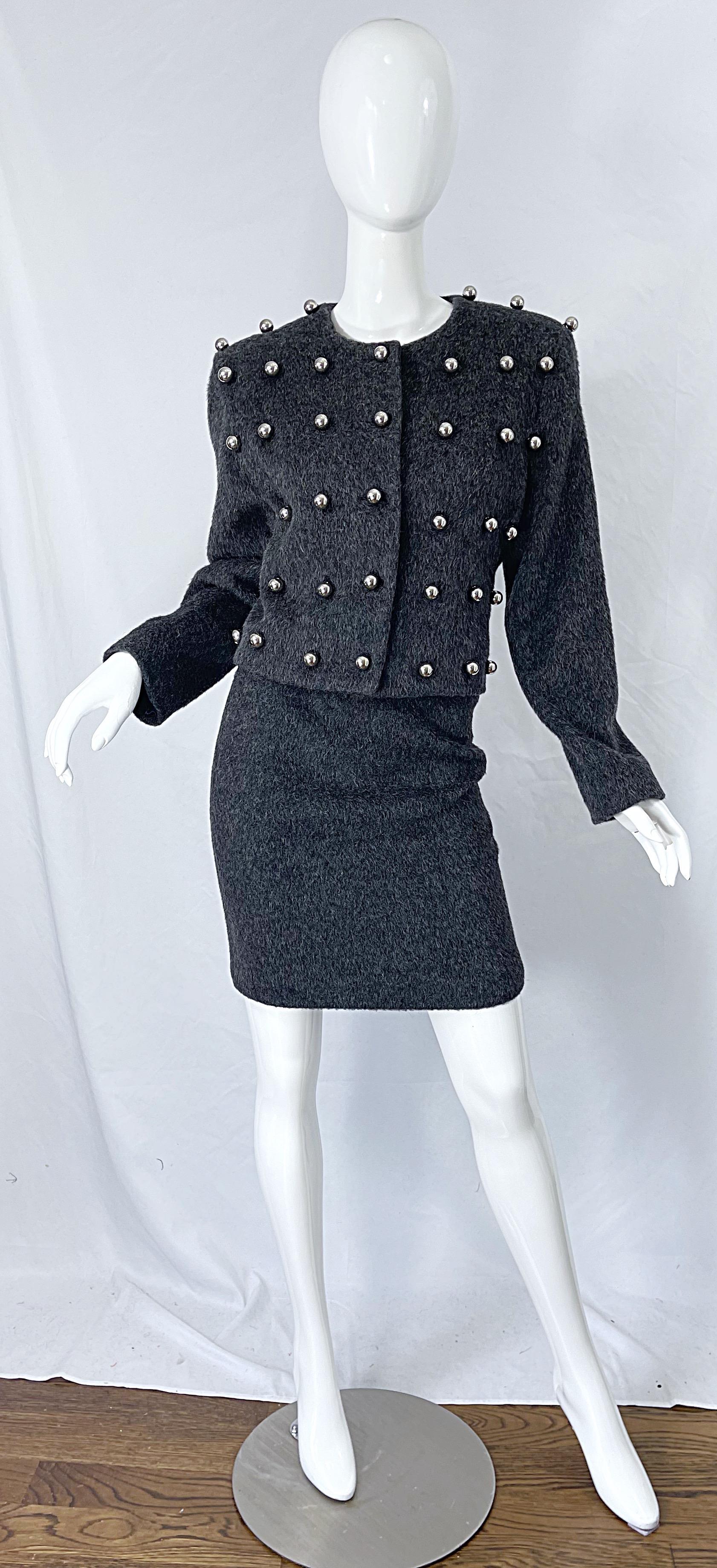Rare Avant Garde PATRICK KELLY late 80s charcoal gray silver studded ball skirt suit ! Tailored jacket features hand-sewn silver balls throughout the front. There is also a spare ball sewn into the inside. High waisted mini skirt has hidden zipper