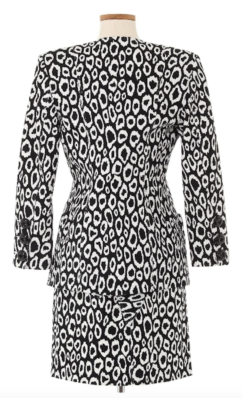 Patrick Kelly Early 1980's B&W Skirt Suit with Corset. This is a super fun three-piece skirt suit in a black and white leopard print pattern. This set is fearlessly bold, reminiscent of Patrick Kelly's joyful designs. 

Jacket
Shoulders 17.5 in
Bust