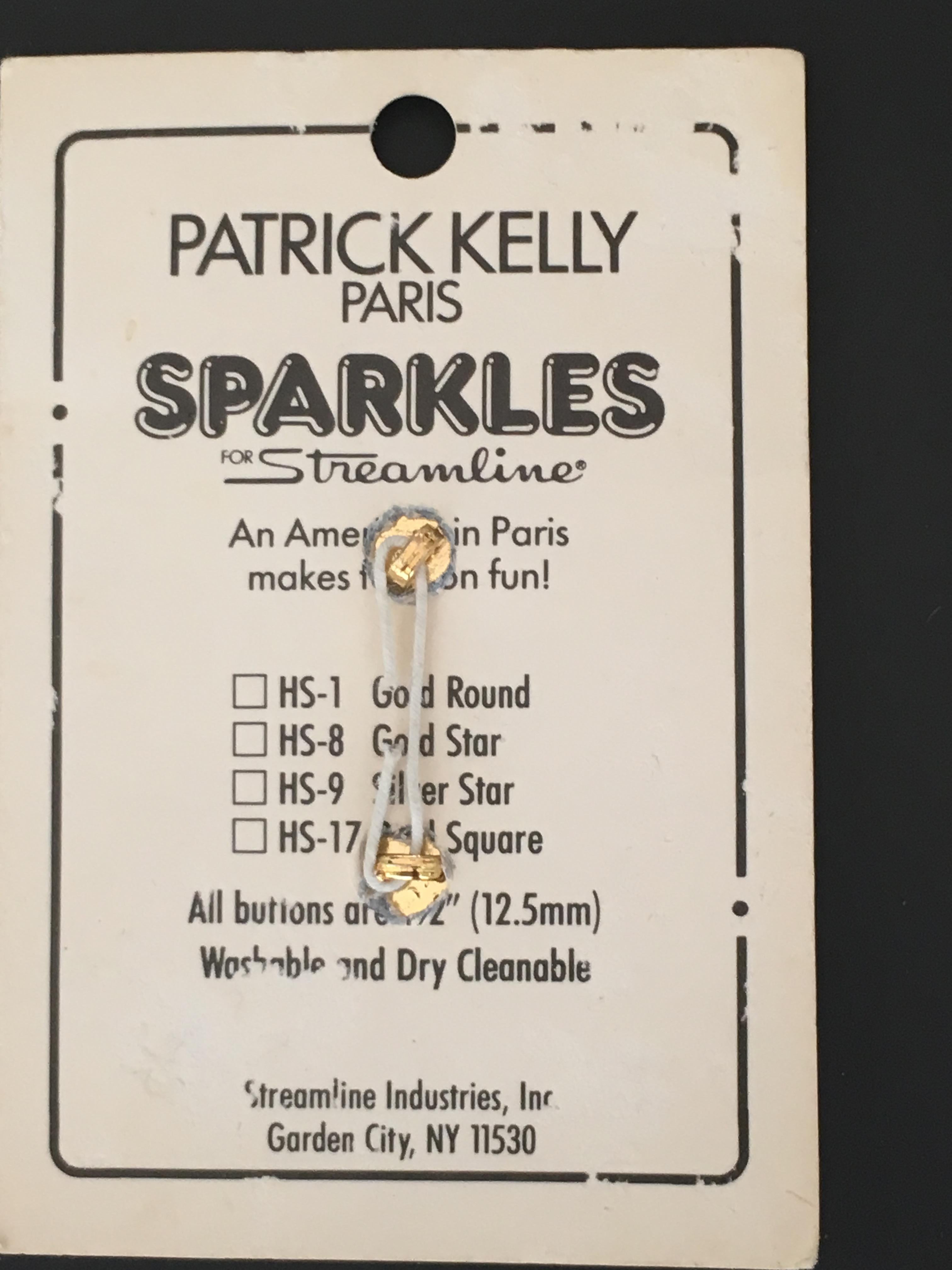 Black Patrick Kelly Paris Gold Star Buttons.