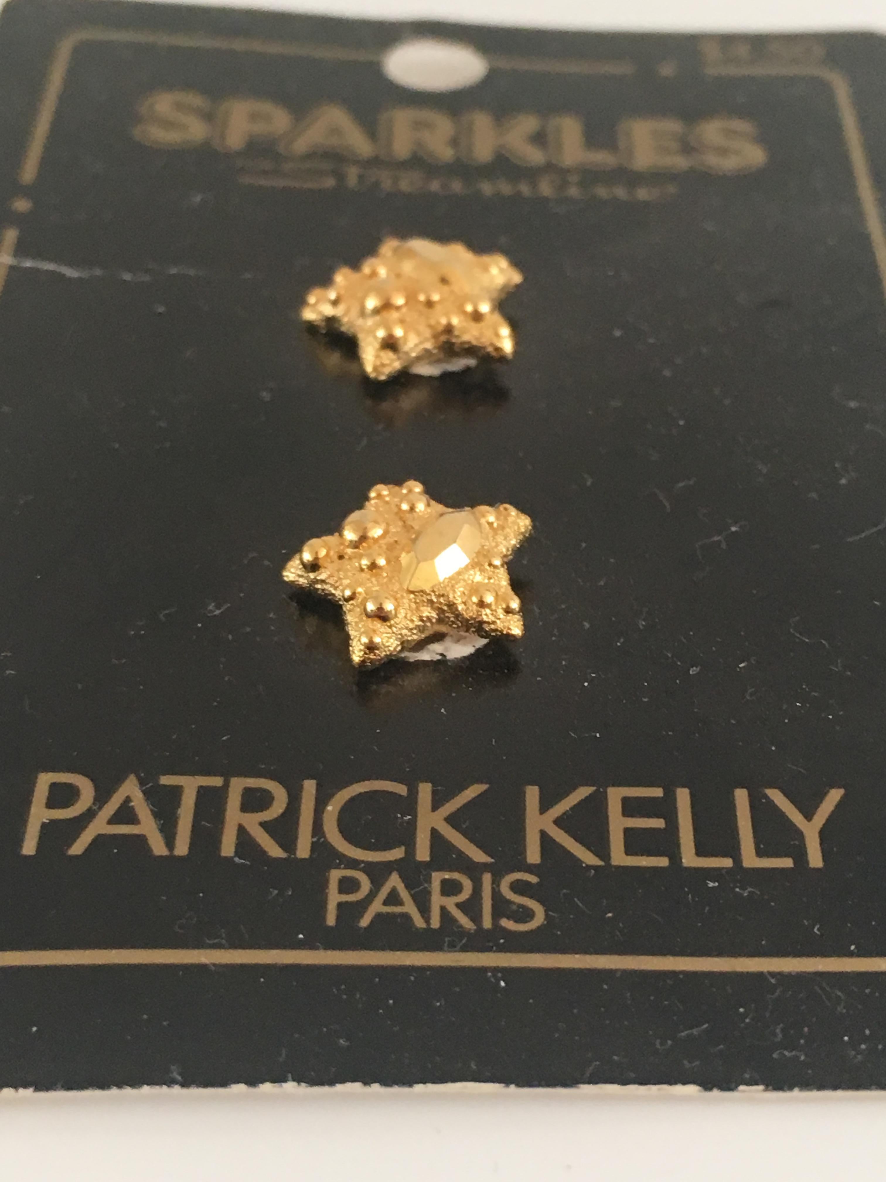 Women's or Men's Patrick Kelly Paris Gold Star Buttons.