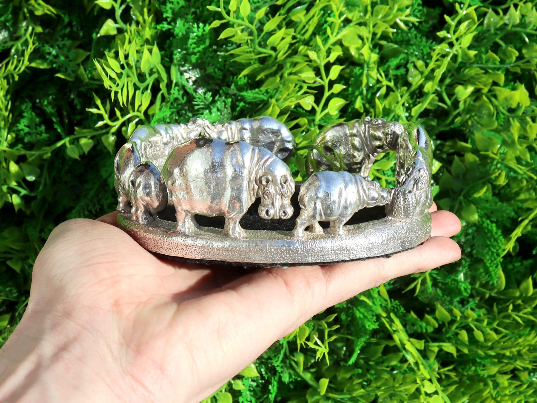 An exceptional, fine and impressive pair of contemporary sterling silver African animal themed coasters made by Patrick Mavos; an addition to our range of collectable silverware.

These exceptional contemporary cast sterling silver wine coasters