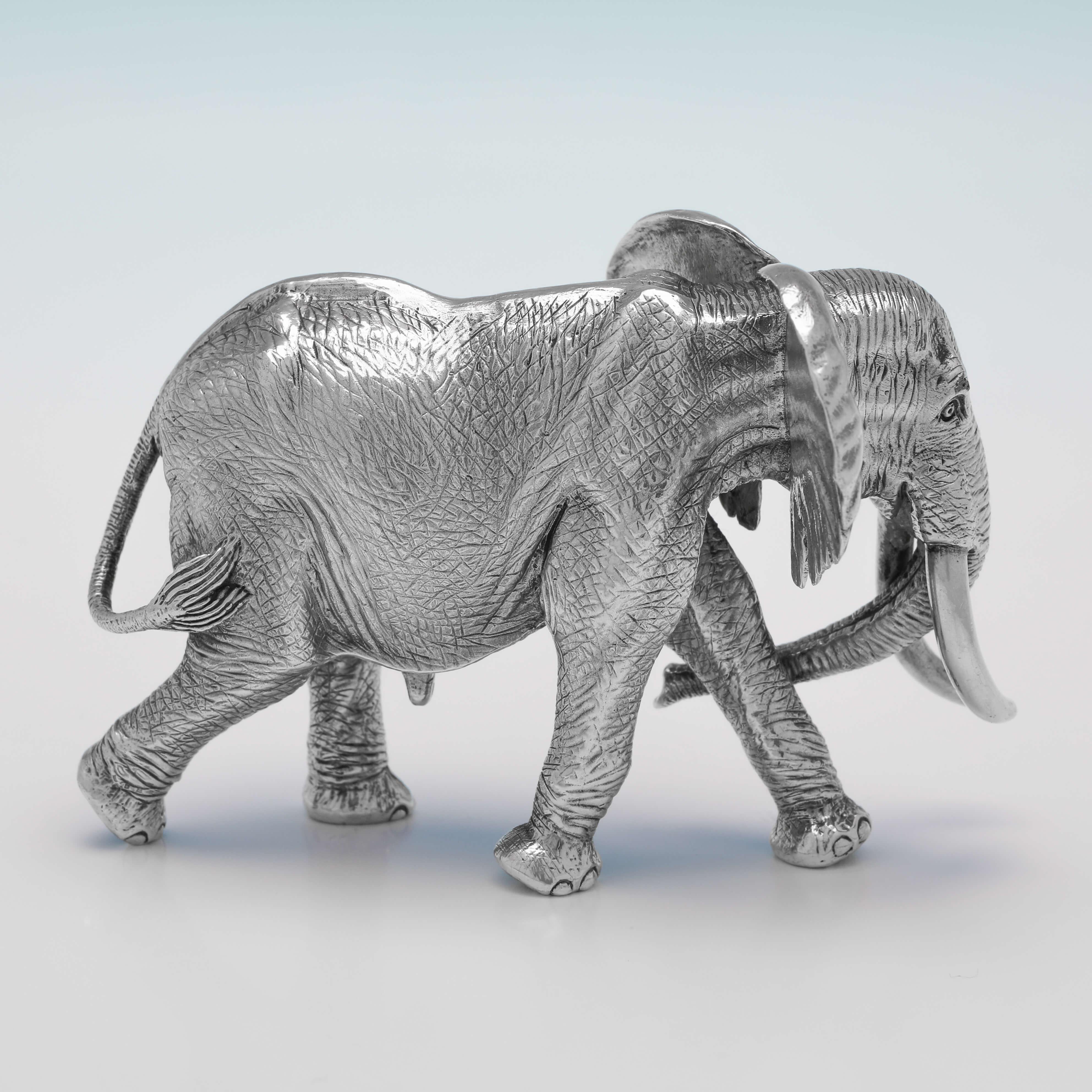 Hallmarked in London in 2005 by Patrick Mavros, this very handsome, Sterling Silver Model of an Elephant, is expertly modelled, and is a representation of an elephant named Joao, one of the 'Magnificent Seven Elephants' who lived at the Kruger