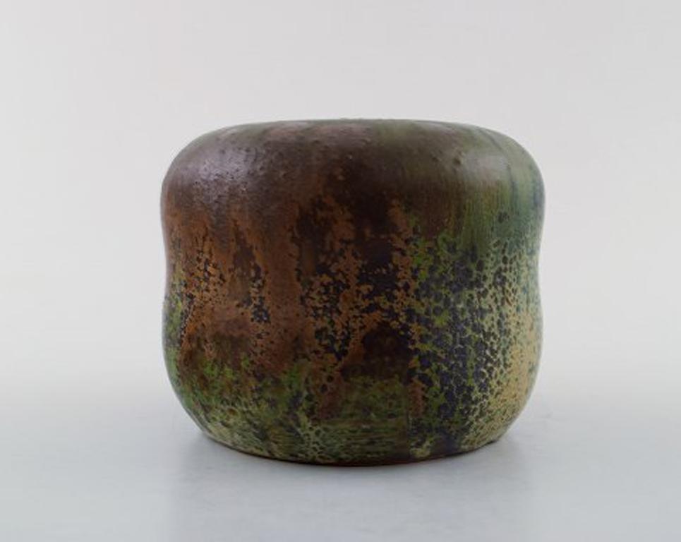 Patrick Nordstrøm or Carl Halier stoneware vase for Royal Copenhagen, circa 1920. Beautiful glaze in earth tones.
Stamped: 30 / 23a.
Measures: 12 cm x 9.5 cm.
In very good condition.