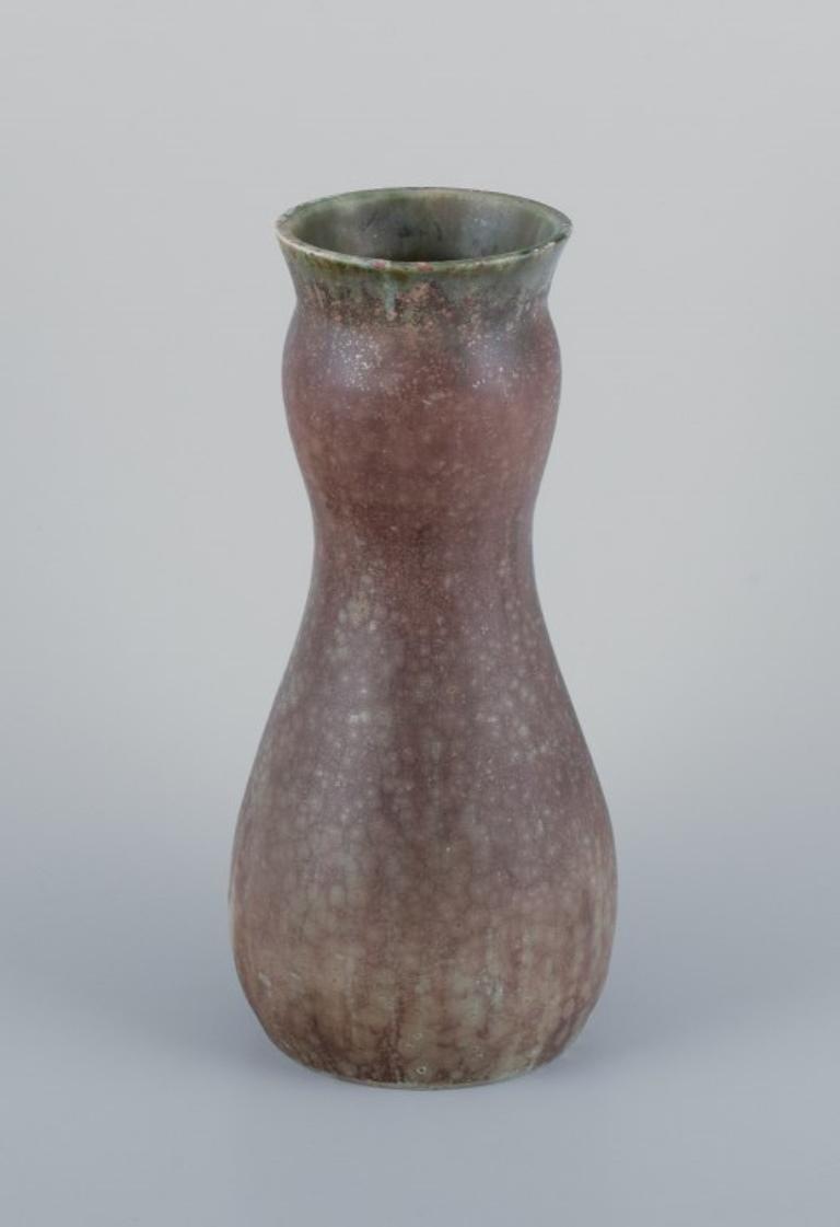 Patrick Nordström (1870-1929) for Royal Copenhagen. 
Large ceramic vase in eggshell glaze.
High-quality ceramic vase in exceptionally fine condition.
Dated 29.02.1920.
Marked.
In perfect condition.
First factory quality.
Dimensions: H 32.0 cm x D