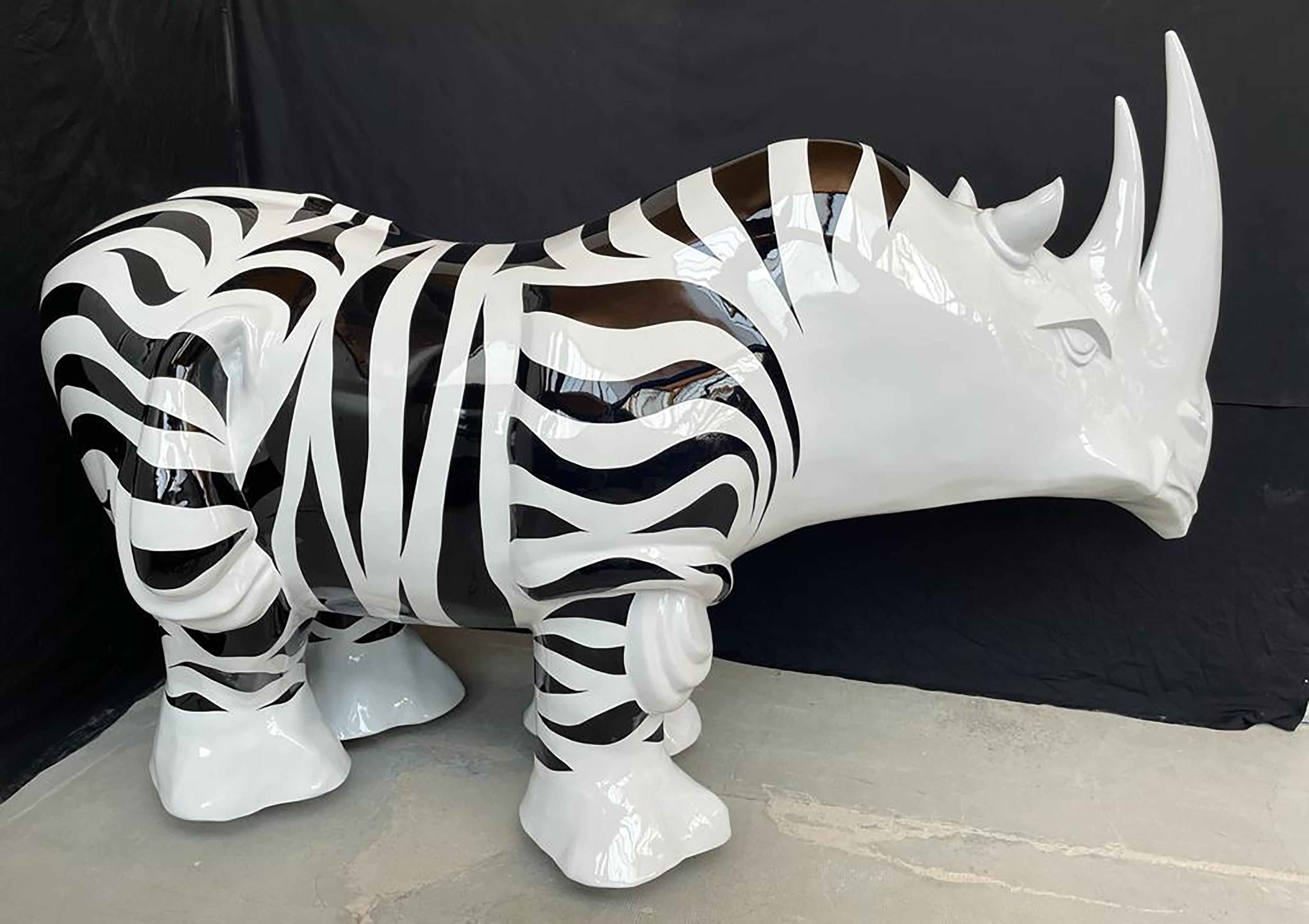 Rhinozebros 120 - Adorned with a zebra skin - Monumental Outdoor Sculpture - Black Figurative Sculpture by Patrick Schumacher