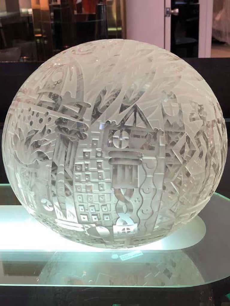 Fine art etched and sandblasted glass sphere by American artist, Patrick Wadley. (1950-1992) Signed and dated 1991. Patrick Wadley is known for his extraordinary work in glass but was also accomplished in other media including sculpture, painting,