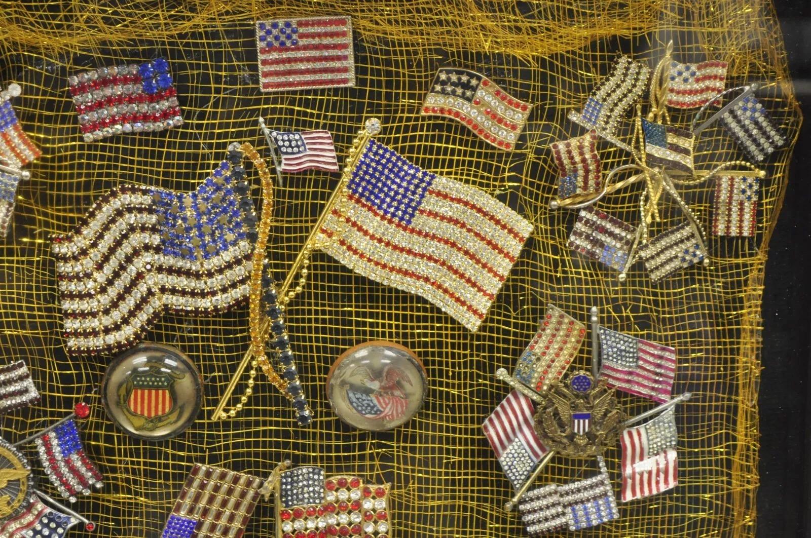 Patriotic American Flag Rhinestone Jewel Brooch Pins Collection Shadowbox Framed Art. The custom work appears to be a mix of approximately 70-80 (unconfirmed) vintage and contemporary costume jewelry pins. Very unique collection in a custom