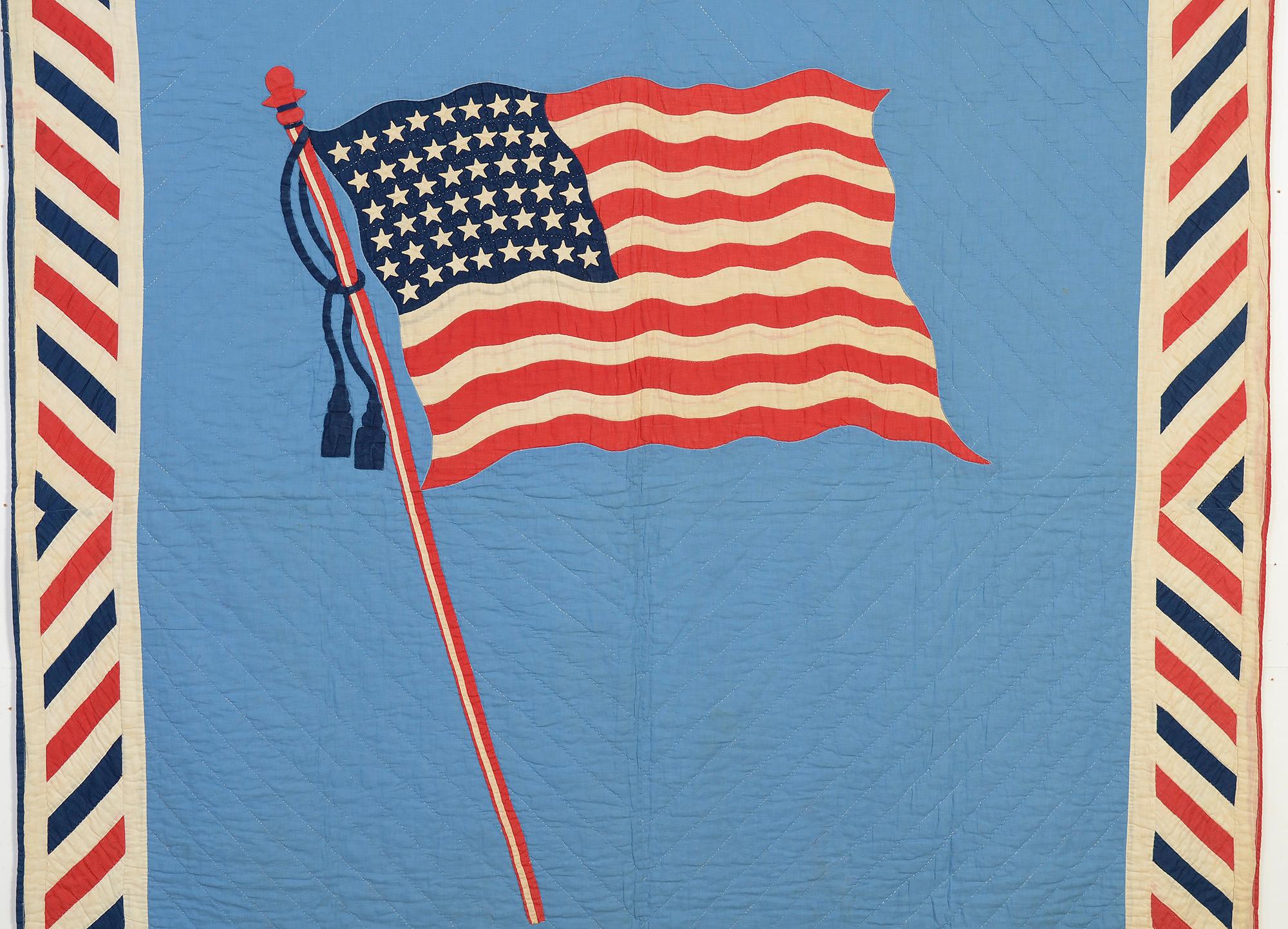 Nothing could be more of the moment than this patriotic flag quilt depicting Old Glory.
It was most likely made either for the admission of Arizona into statehood on February 14, 1912 or during World War I which took place from 1914-1918. In either