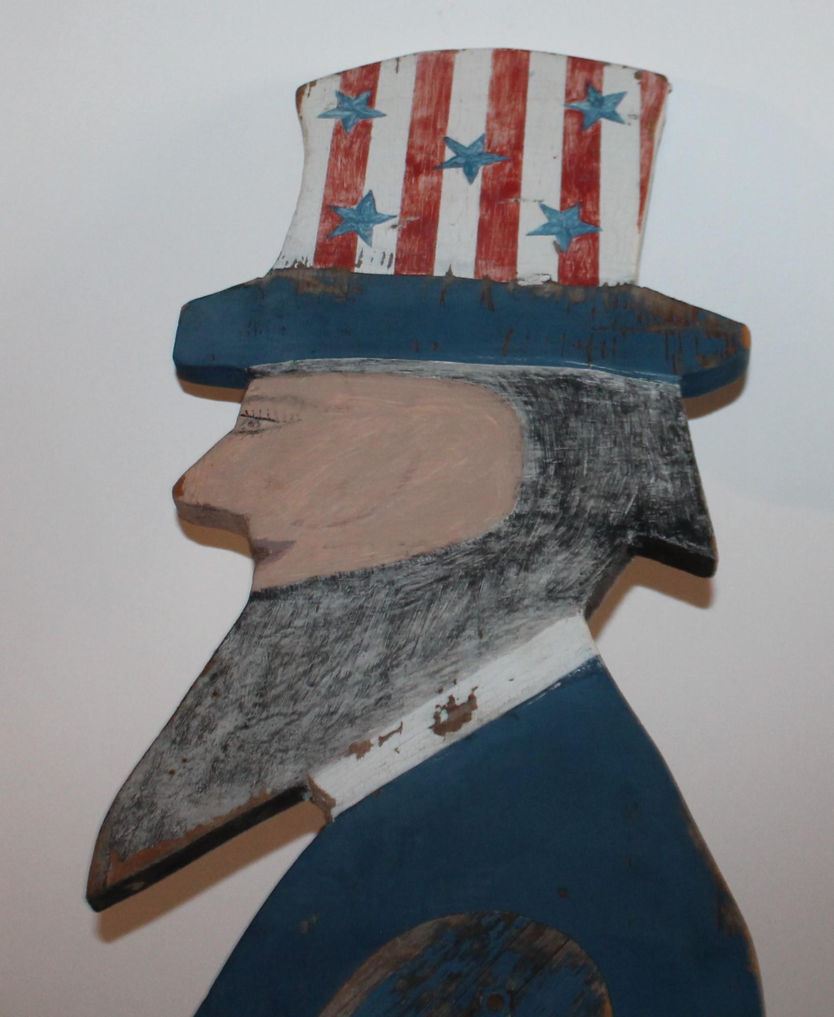 Handmade and painted Uncle Sam in all original painted surface.