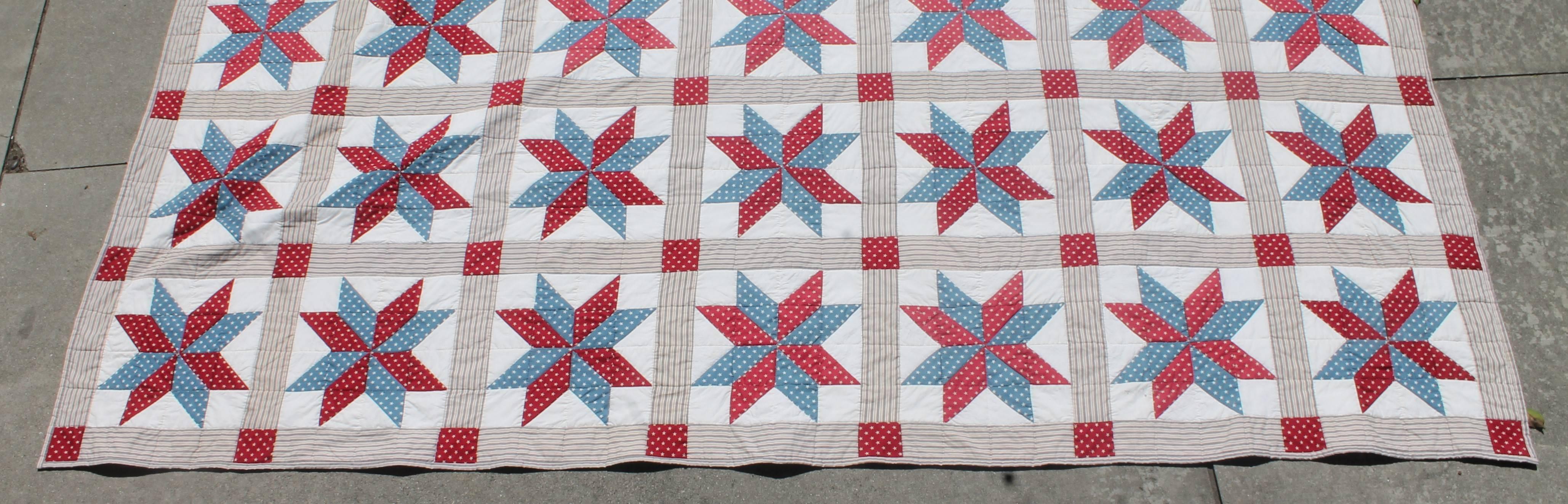 This large finely pieced patriotic quilt is in great condition. This quilt is late but great and is signed and dated by the maker. This quilt will fit a queen or king-size. Signed Anne Preas 1989.